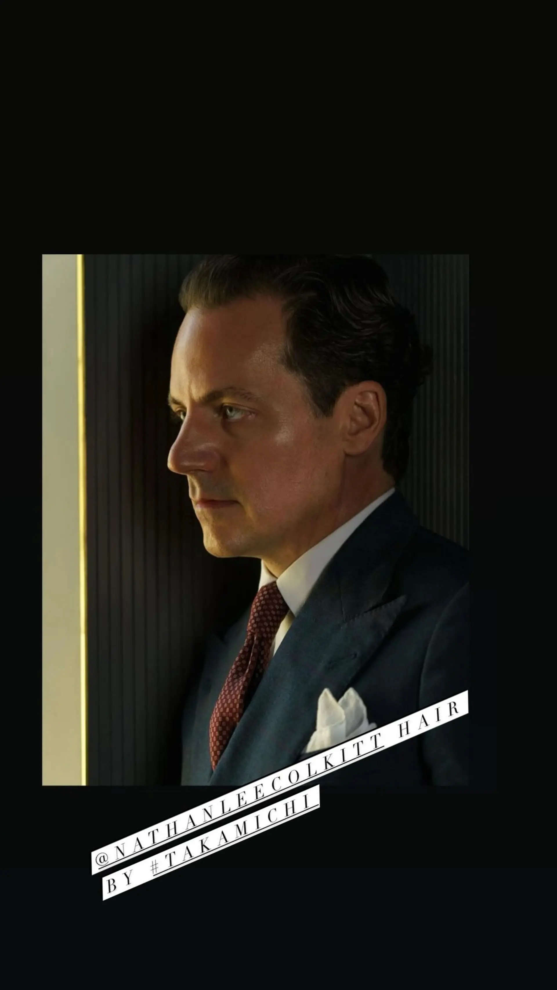 A classic, short wavy hairstyle with a tapered cut to accentuate the natural waves. 1