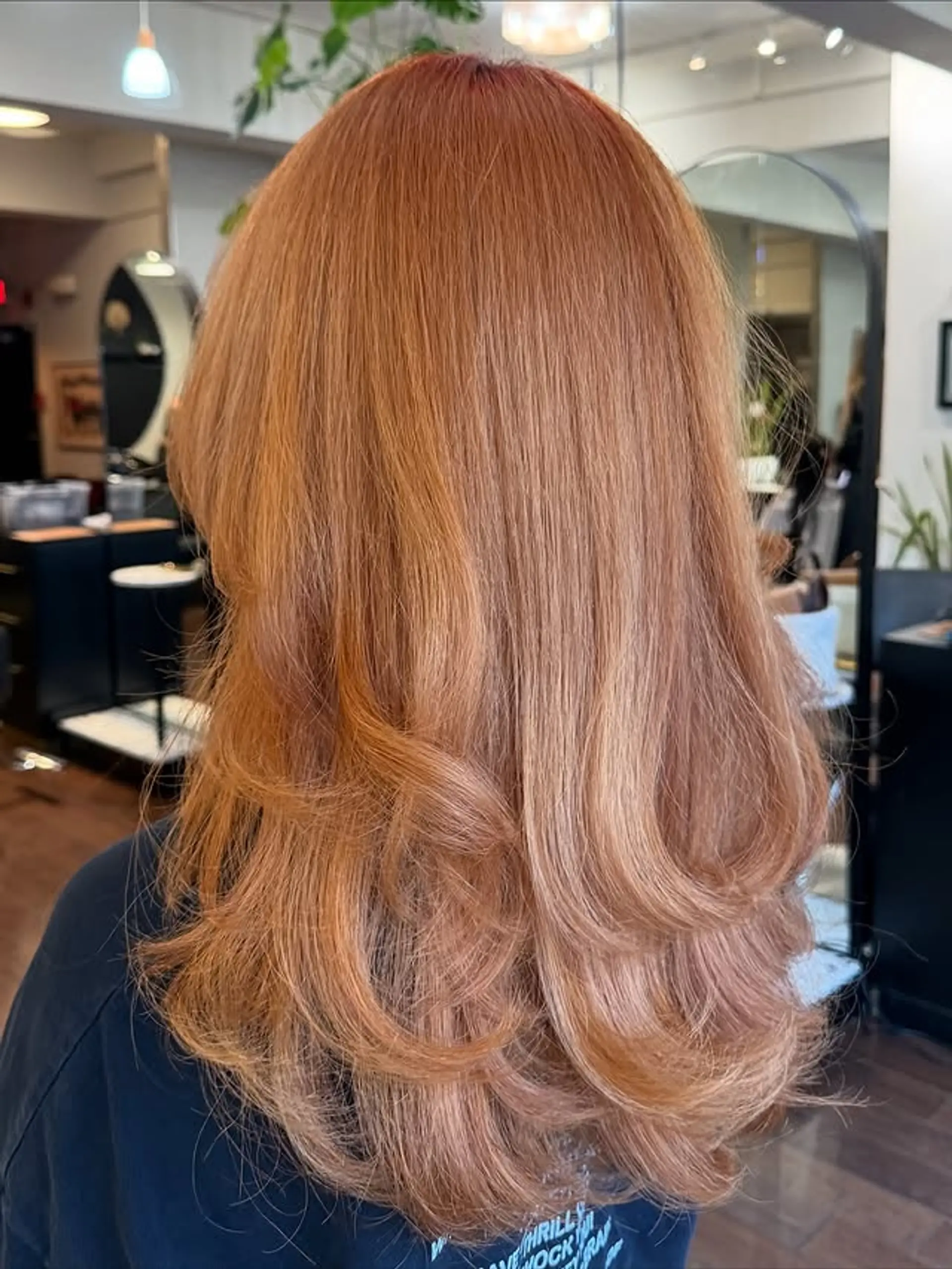 A layered haircut with soft waves. 1