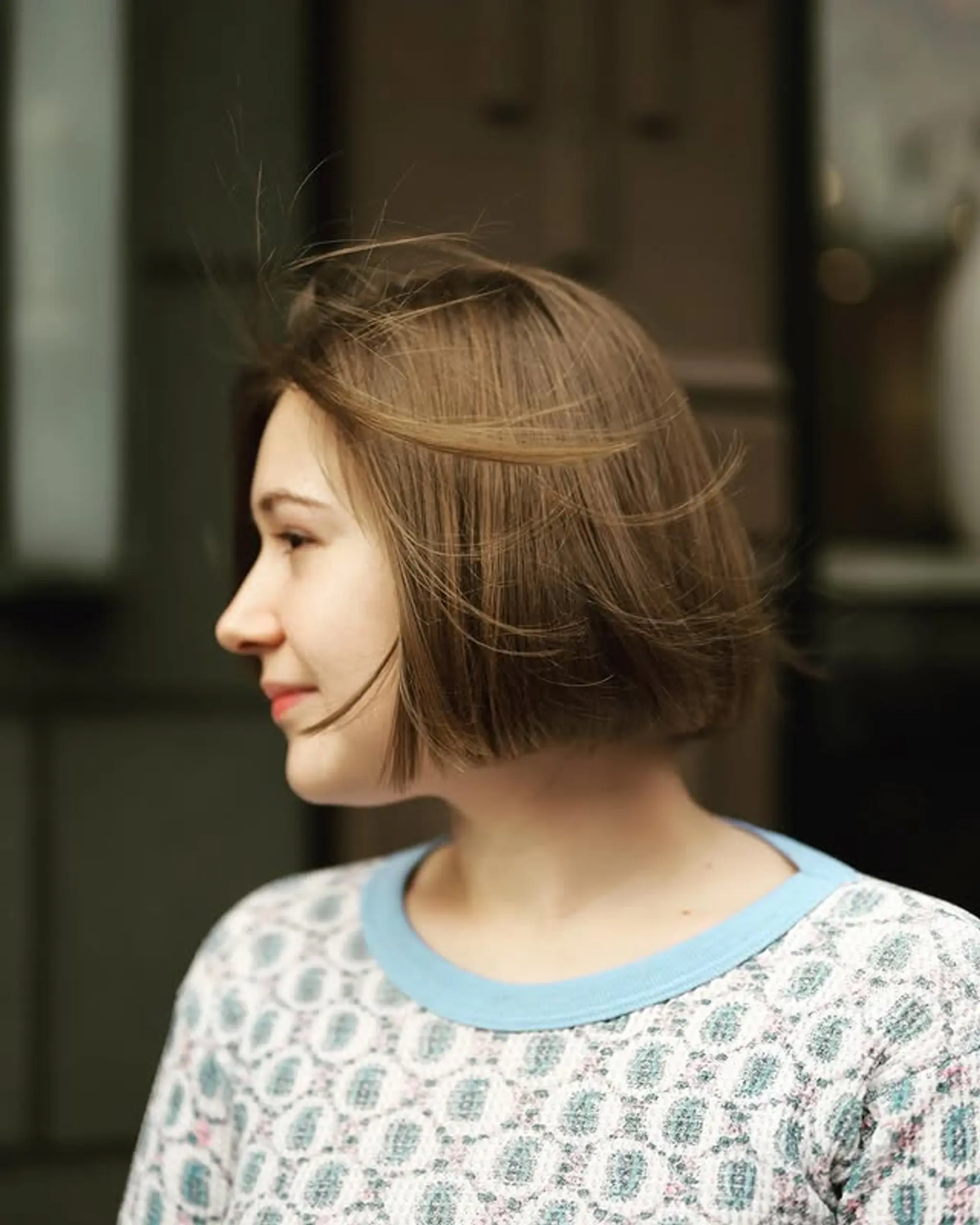 A short, straight blunt bob with a clean, modern edge.