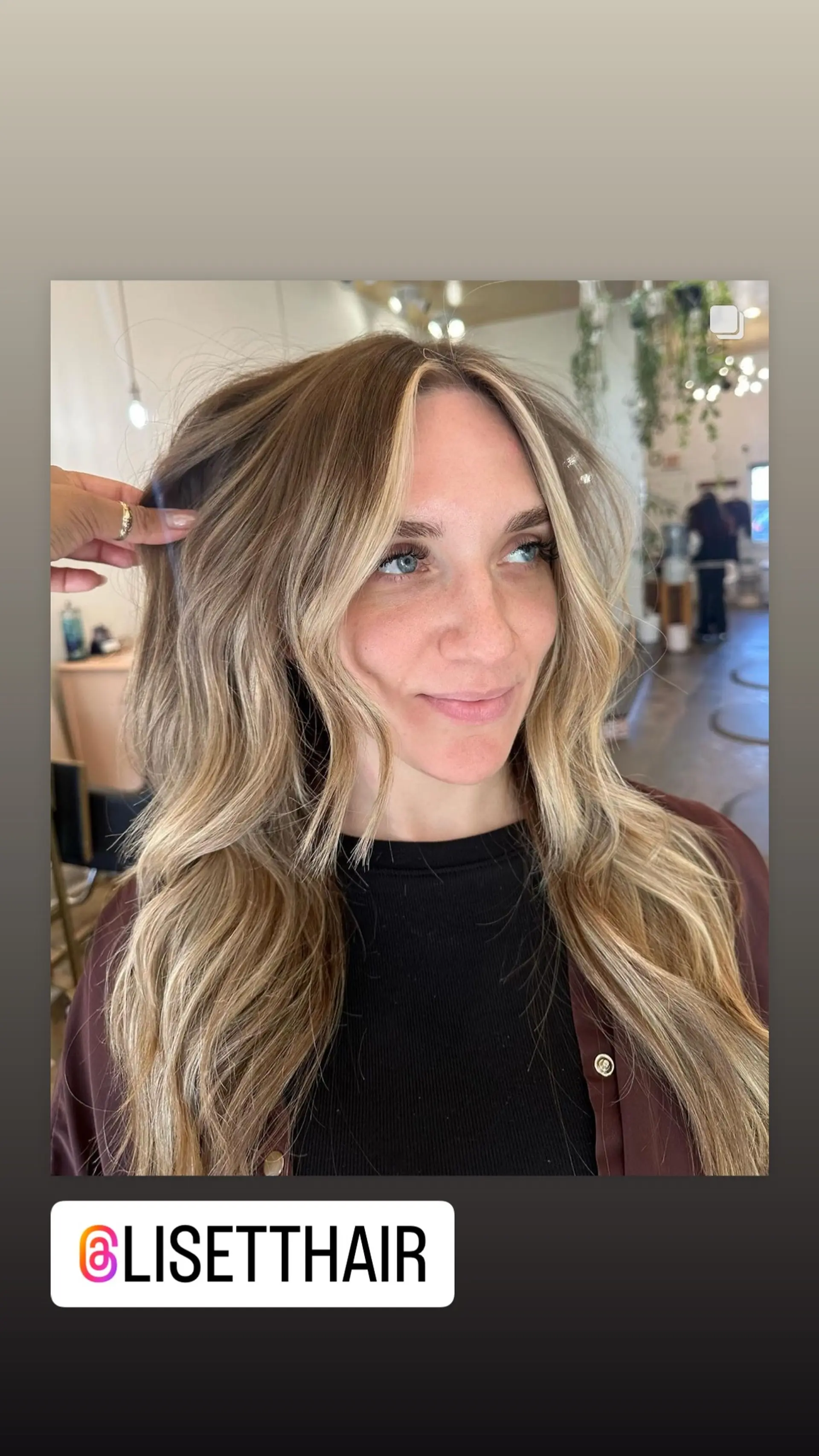 A beautiful long wavy hairstyle with face-framing blonde highlights. 1