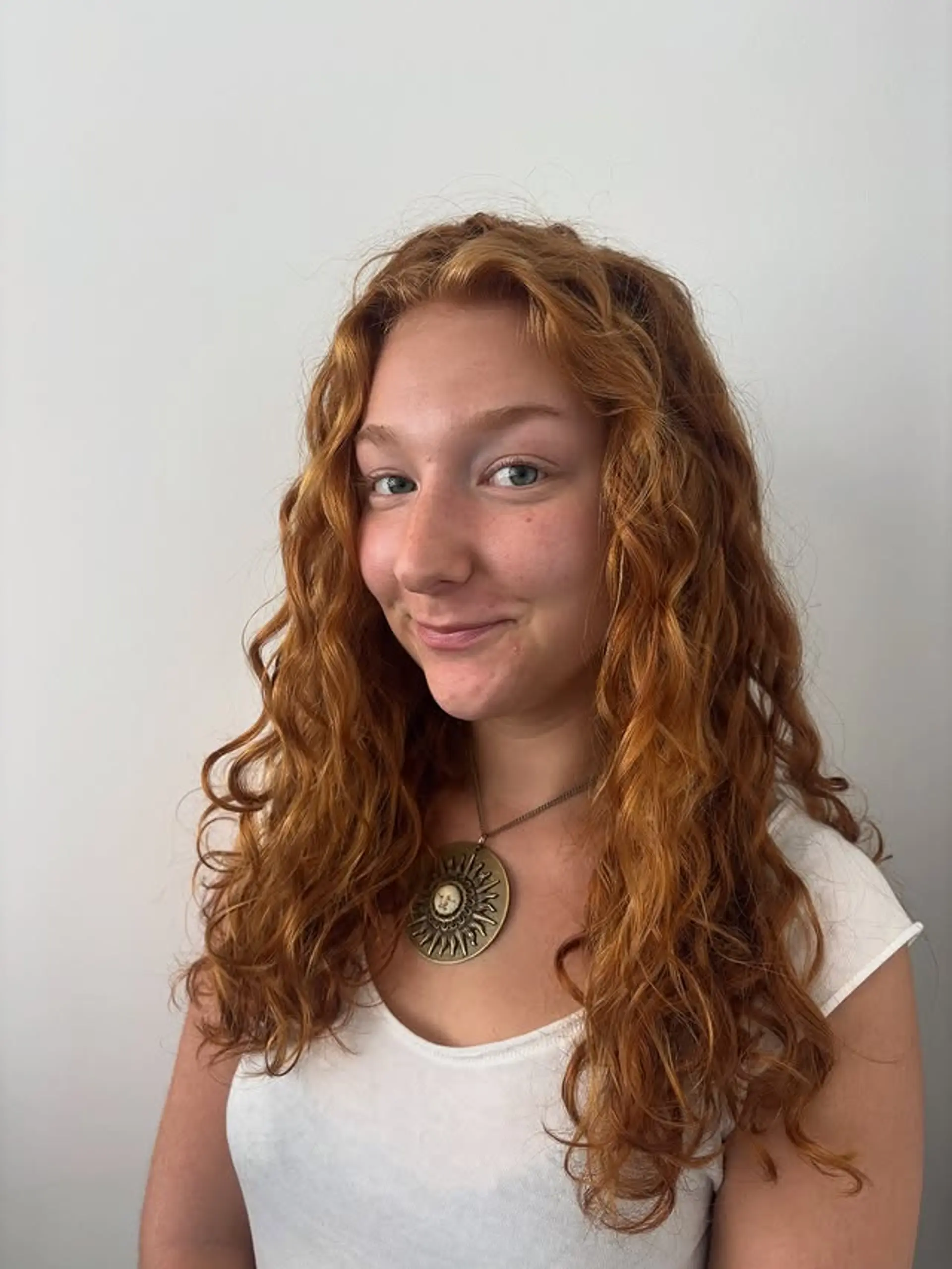 Long, natural curly hairstyle with defined curls. 1