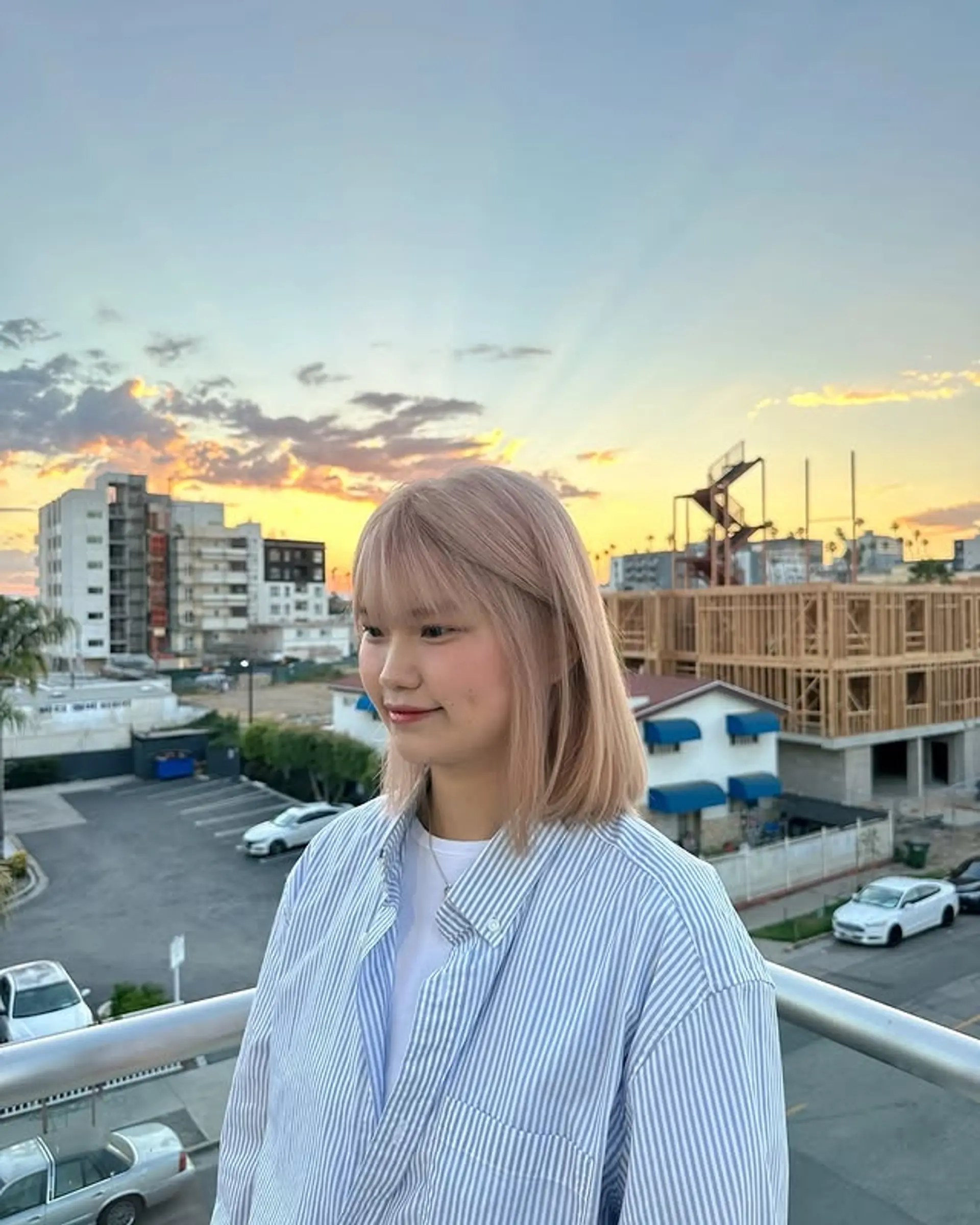A stylish medium-length bob with see-through bangs. 1
