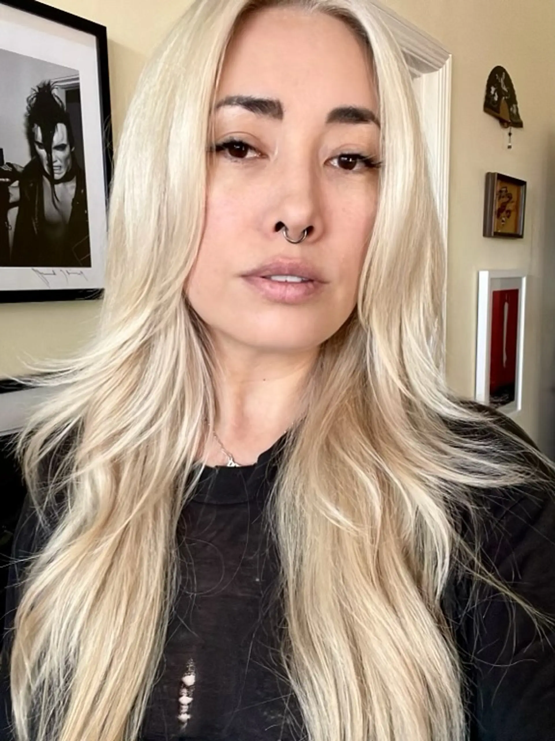 A long, layered shag haircut with face-framing layers. 1