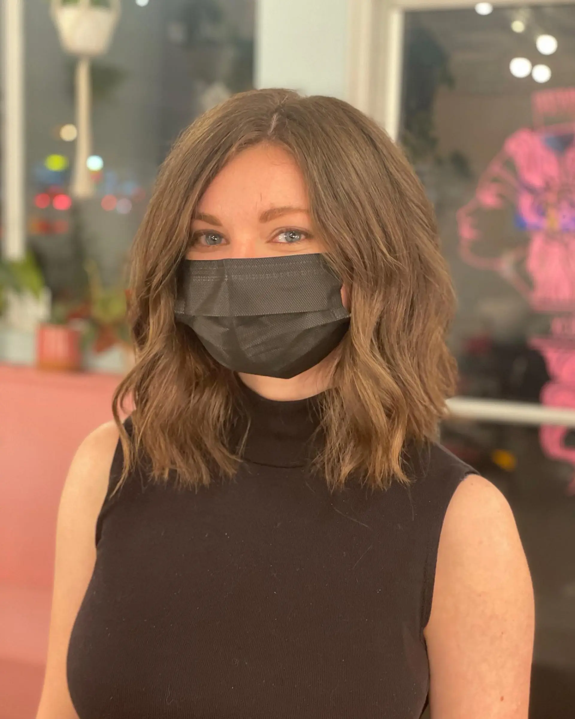 A stylish wavy lob with soft, effortless waves and a modern color blend. 1