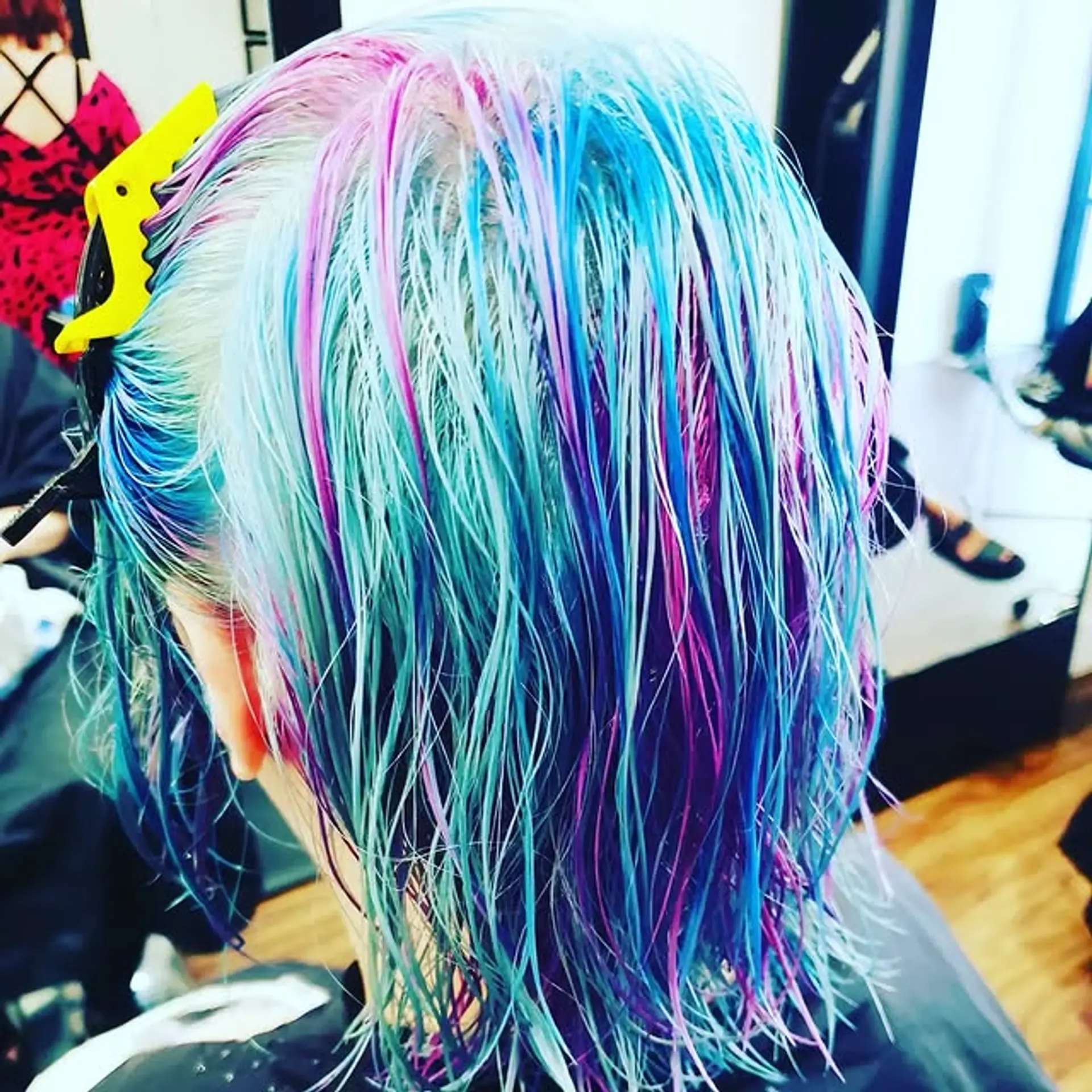 A vibrant blend of fantasy colors create a mesmerizing mermaid effect. 1