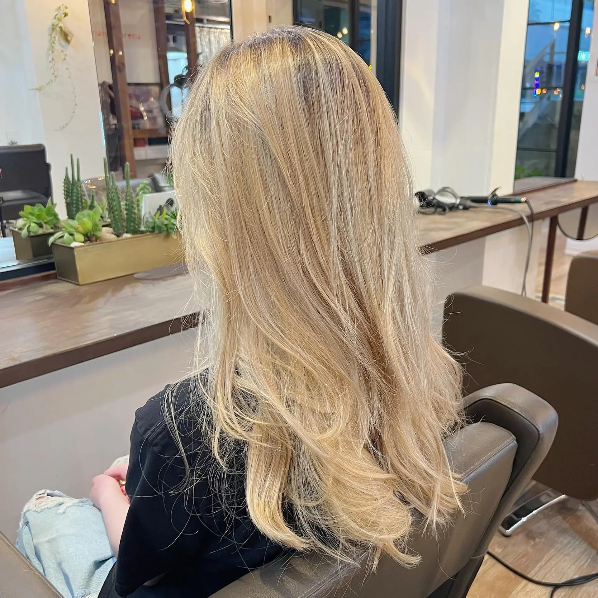 A long hairstyle with layers to add movement and dimension. 2