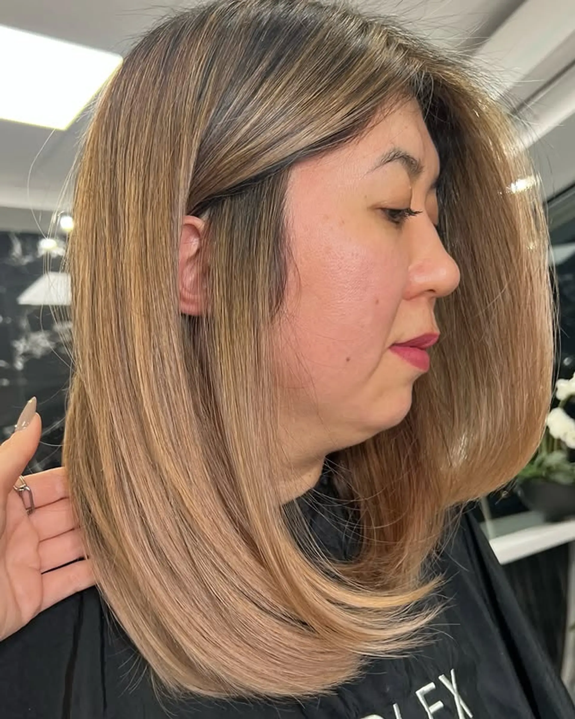 A stylish lob with a seamless bronde balayage. 1