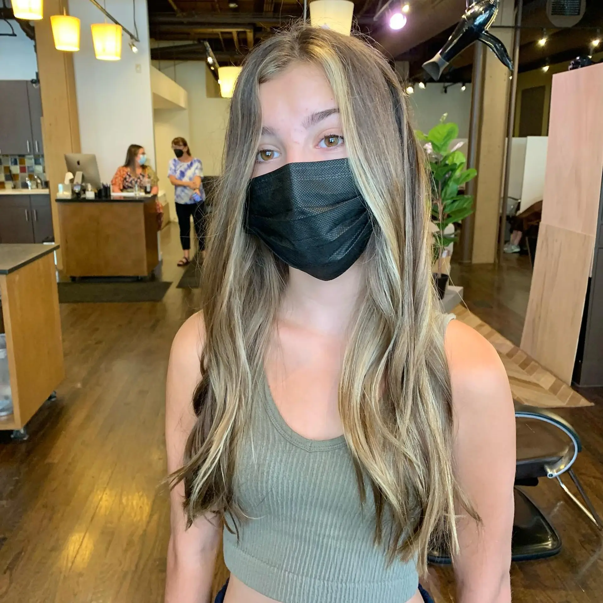 Long straight hair with face-framing blonde highlights and subtle layers. 2