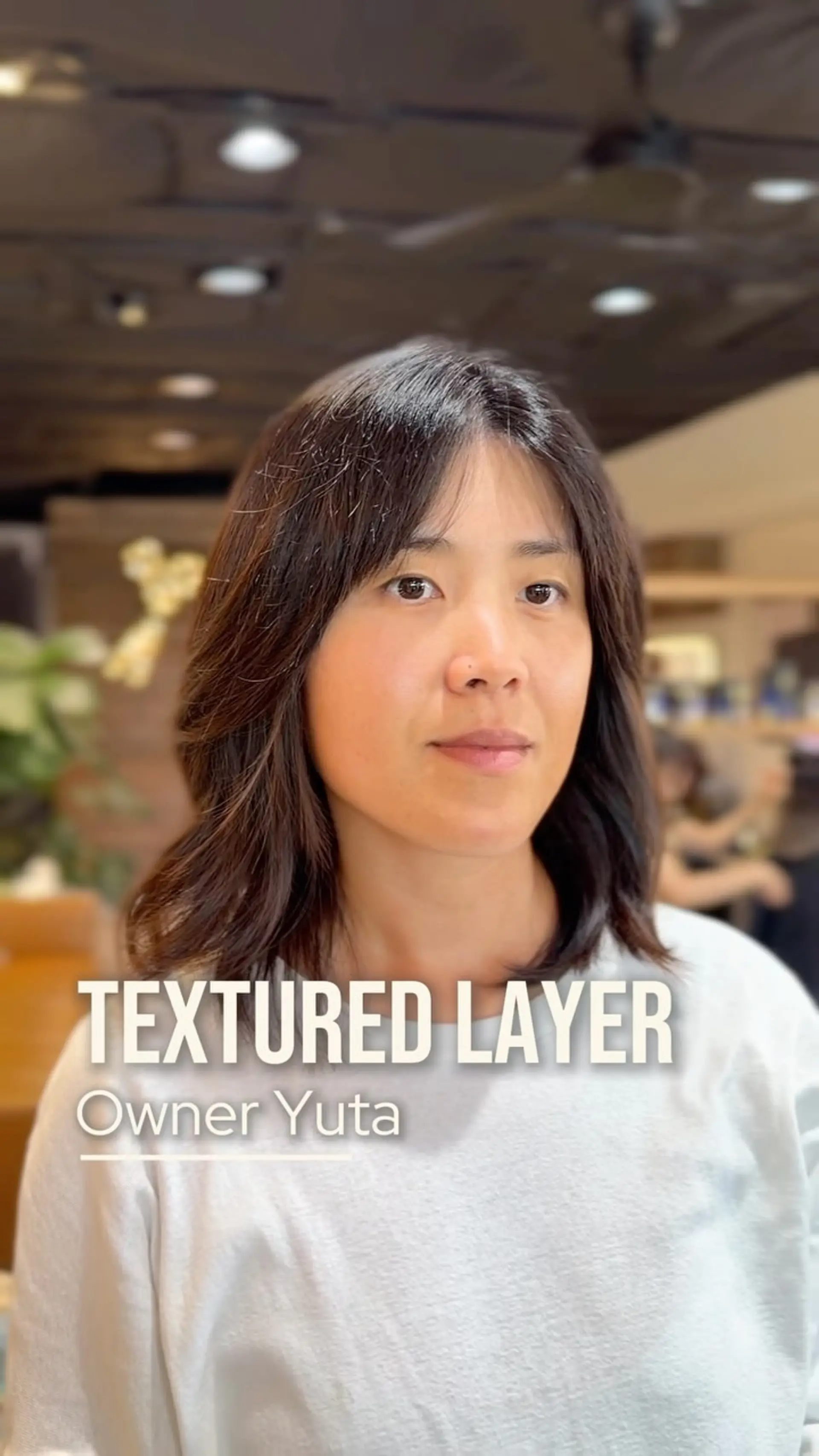 Medium-length textured haircut with soft, piecey layers and wispy face-framing fringe. 1