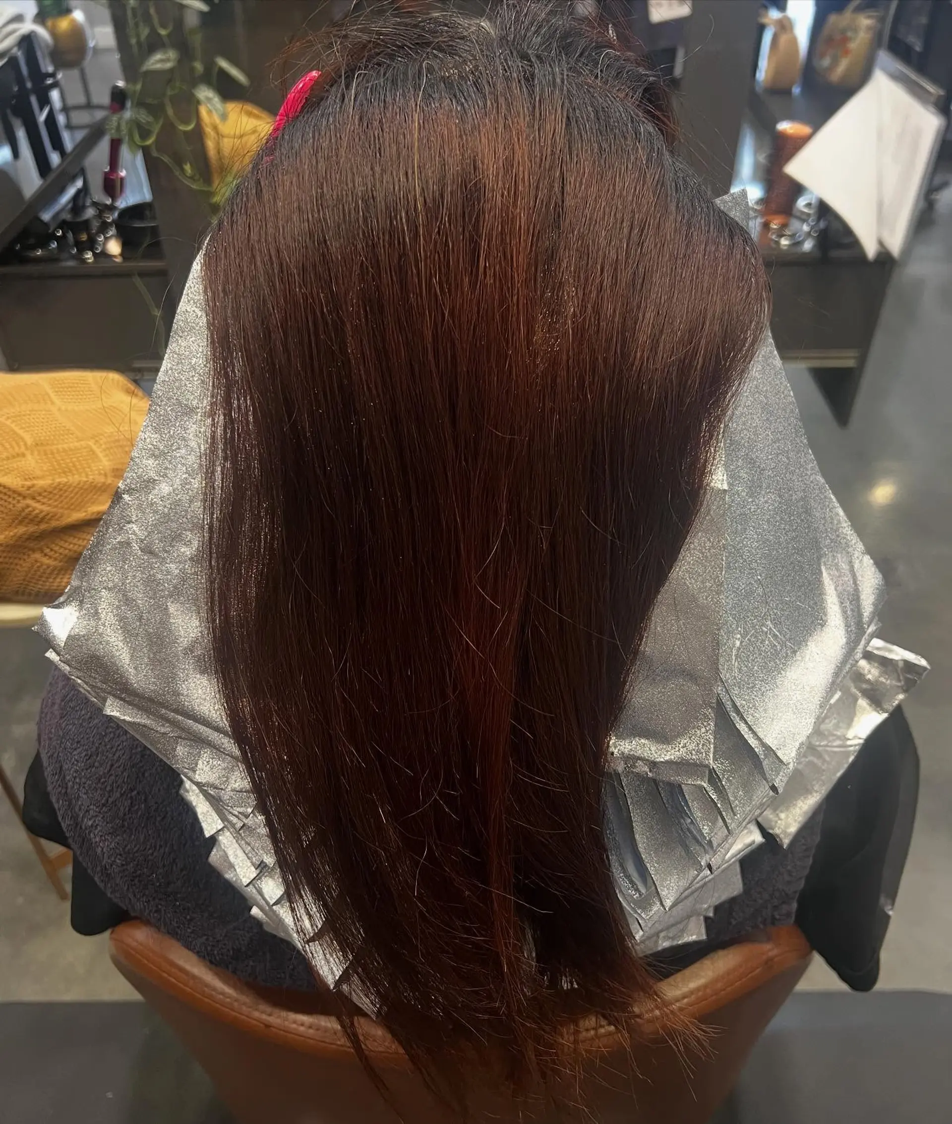 A very long, straight, layered hairstyle with golden blonde waves. 2