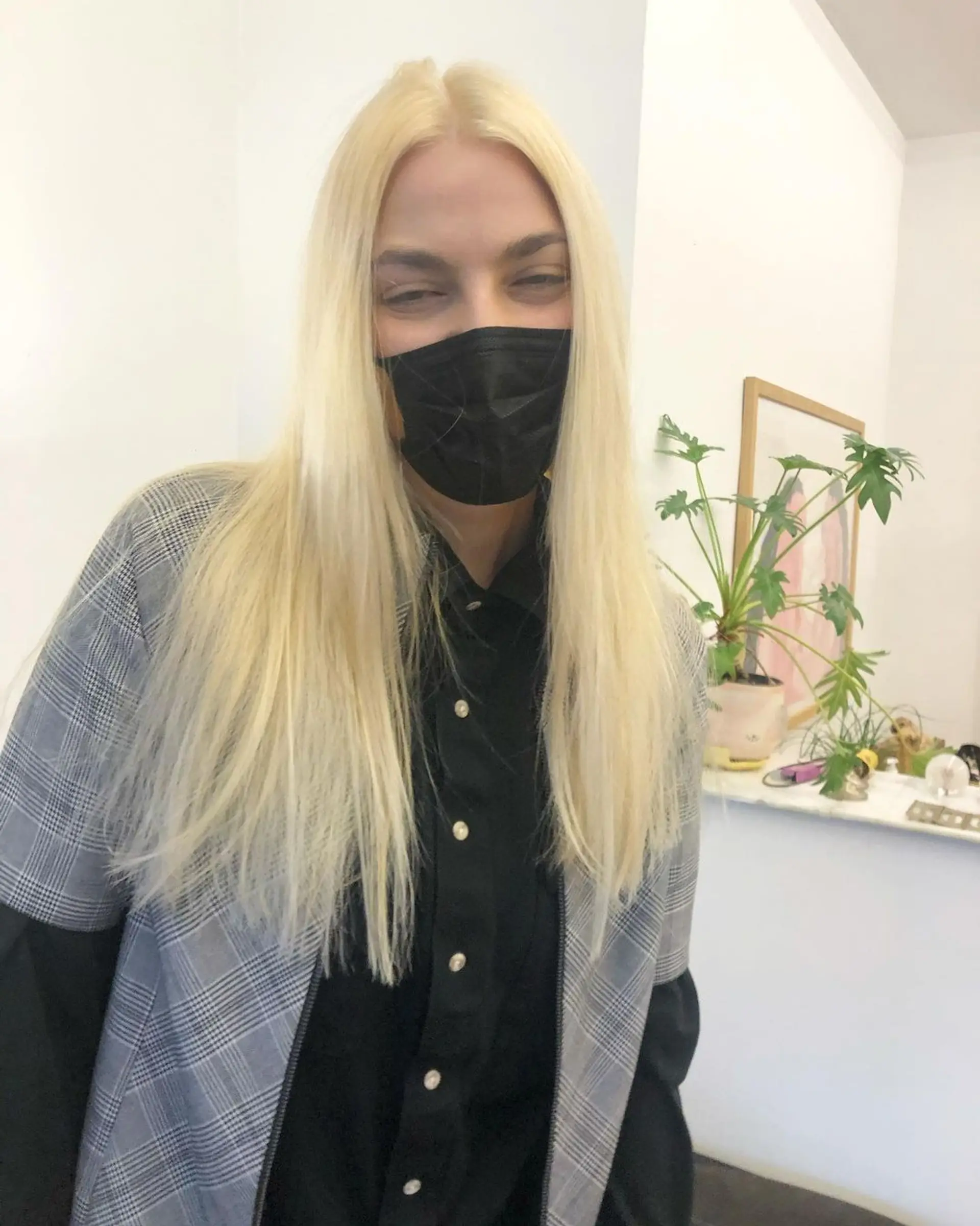 A sleek, straight, and very long platinum blonde hairstyle with a smooth and silky texture. One time bleach, with toner, took 3 hours by @ takeohair 3