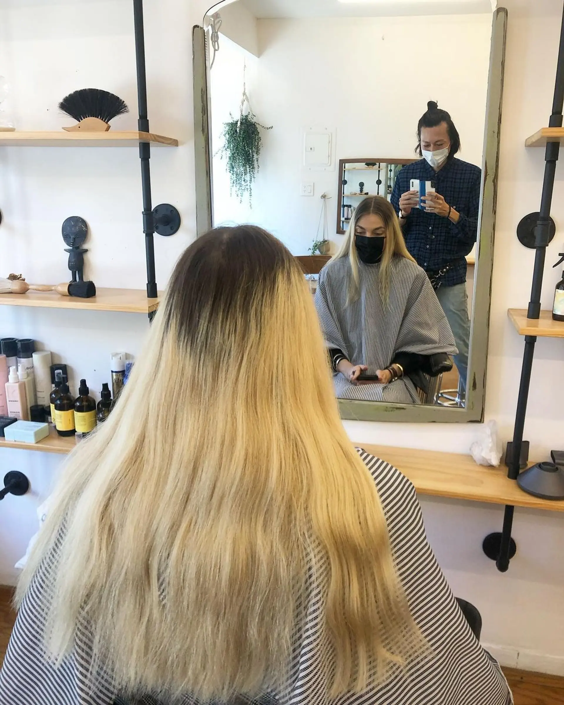 A sleek, straight, and very long platinum blonde hairstyle with a smooth and silky texture. One time bleach, with toner, took 3 hours by @ takeohair 2