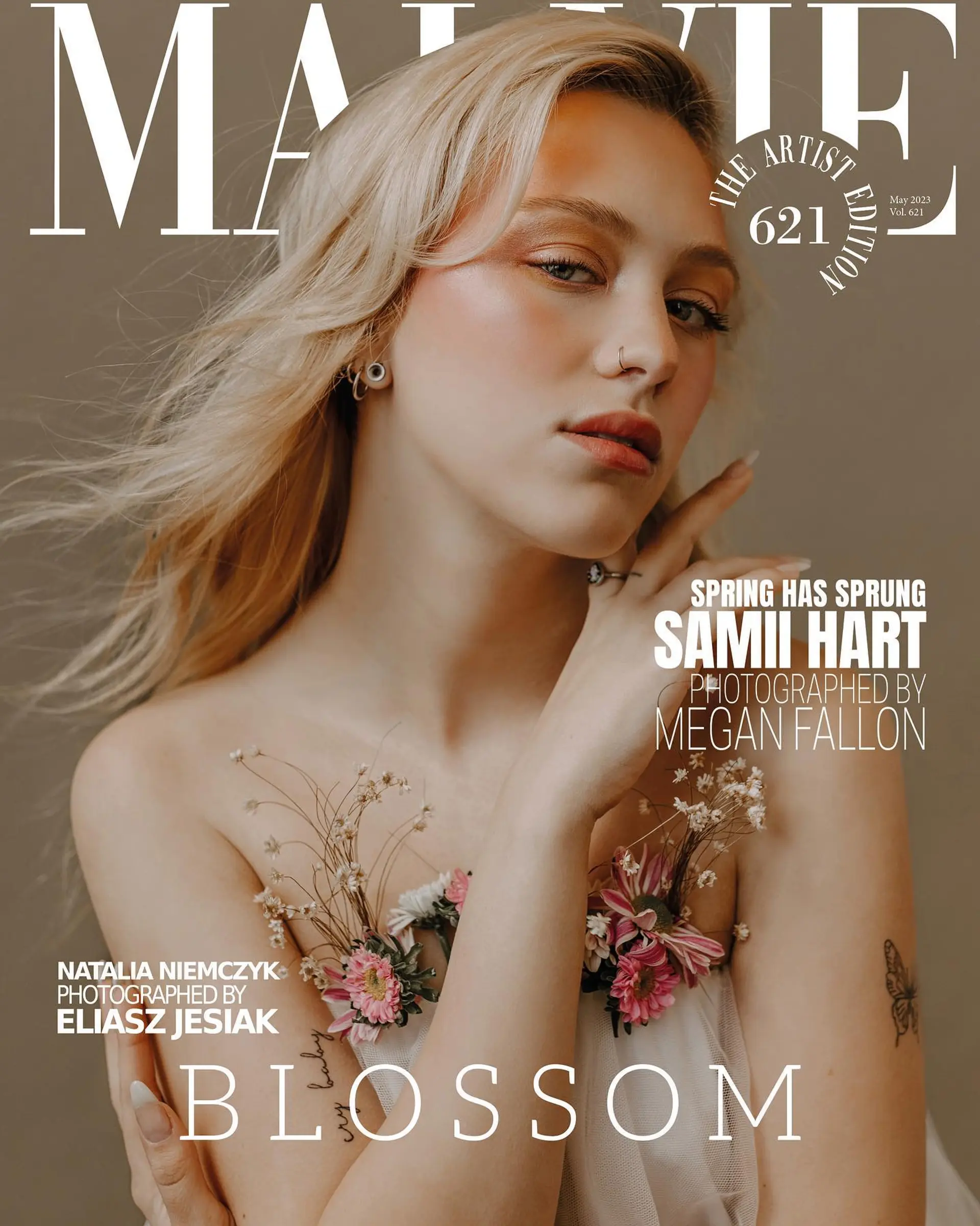 A soft, airy windswept blonde blowout with light face-framing movement designed for an editorial look. 1