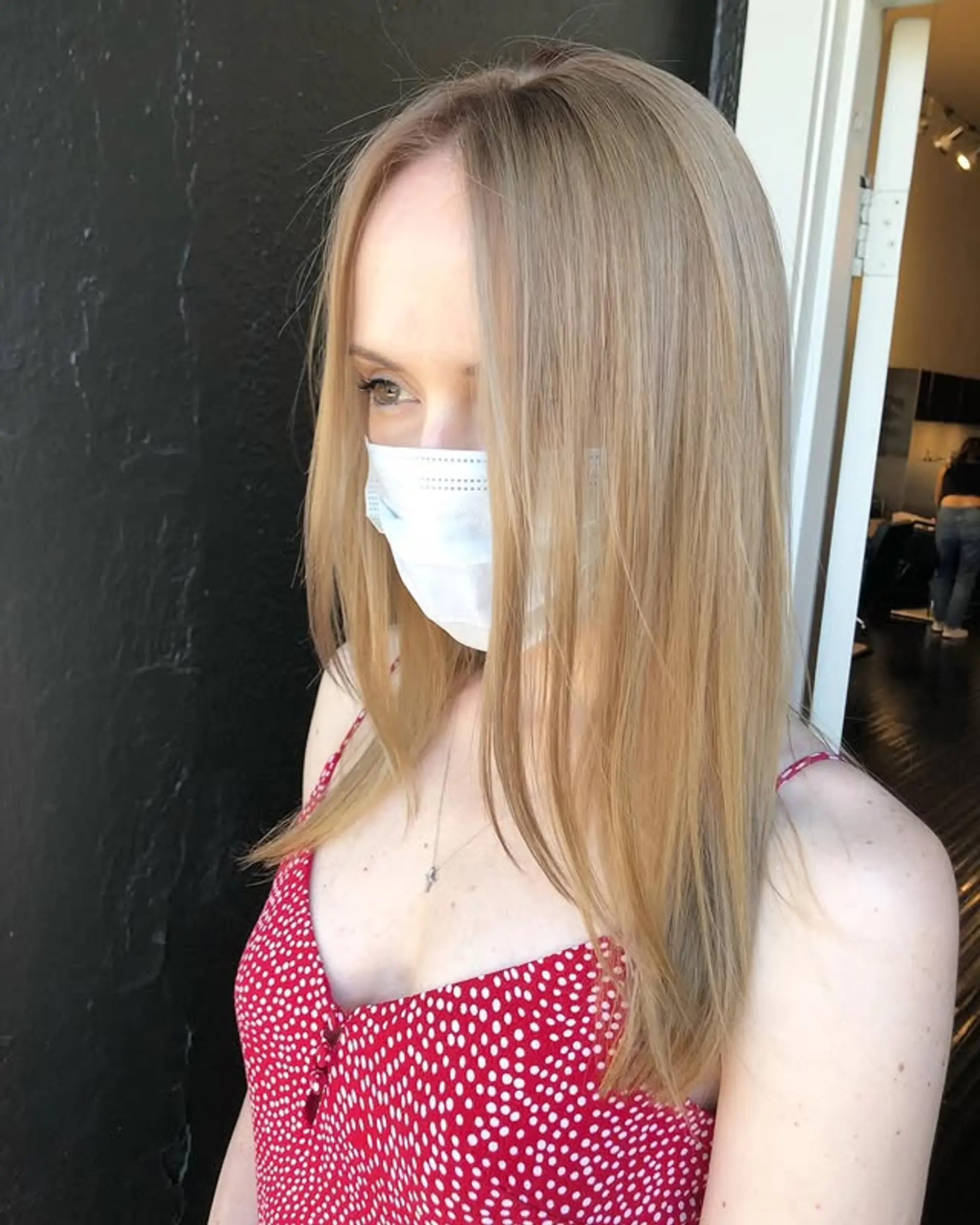 A medium-length straight bob with a center part. 1