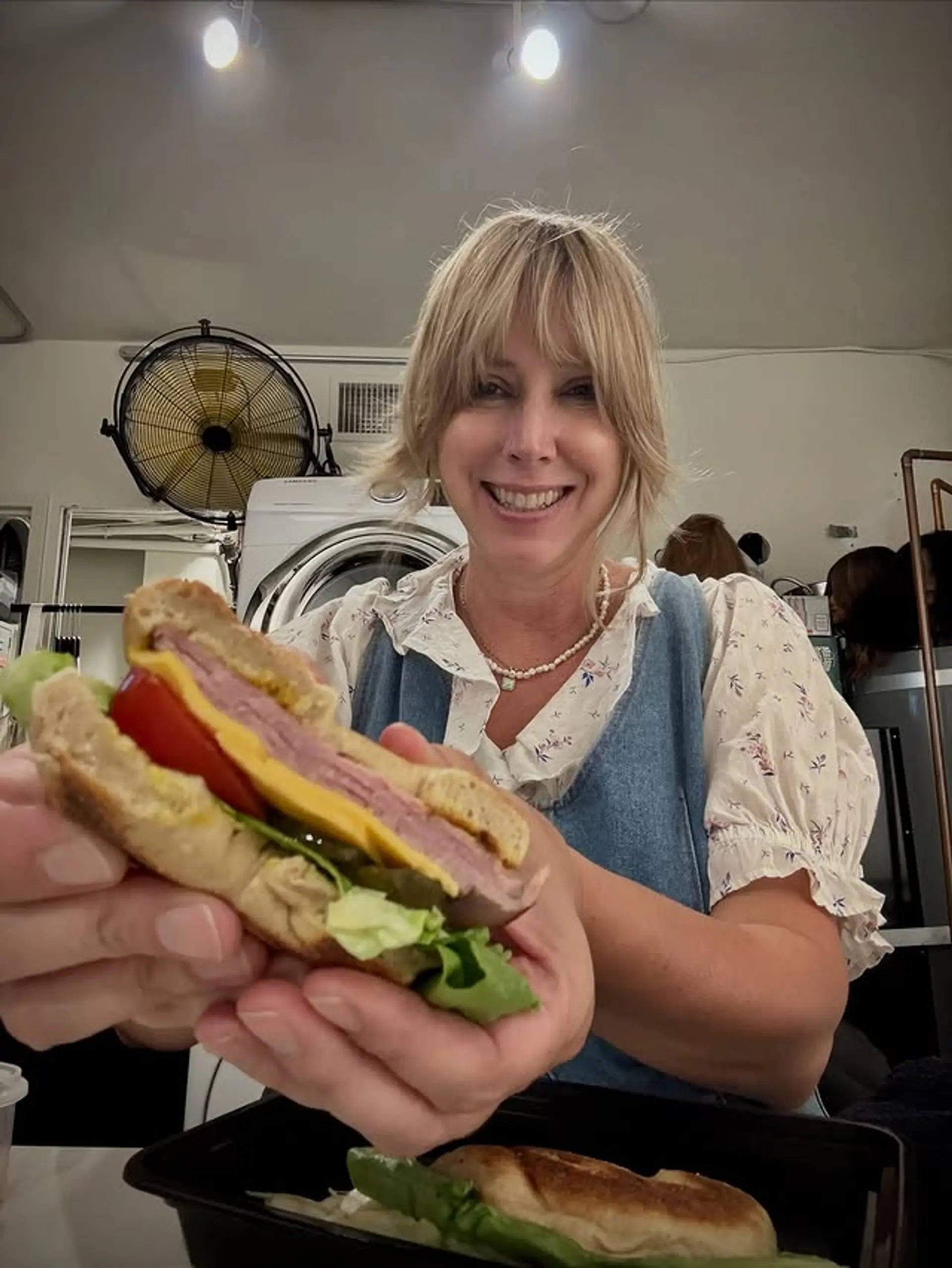 A choppy, layered shag haircut with full bangs. 1