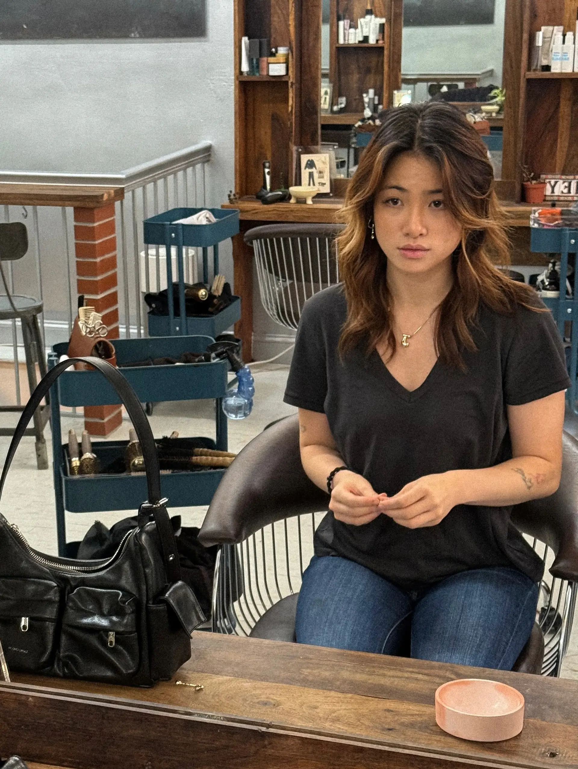 A medium-length shag with layers and balayage highlights. 3