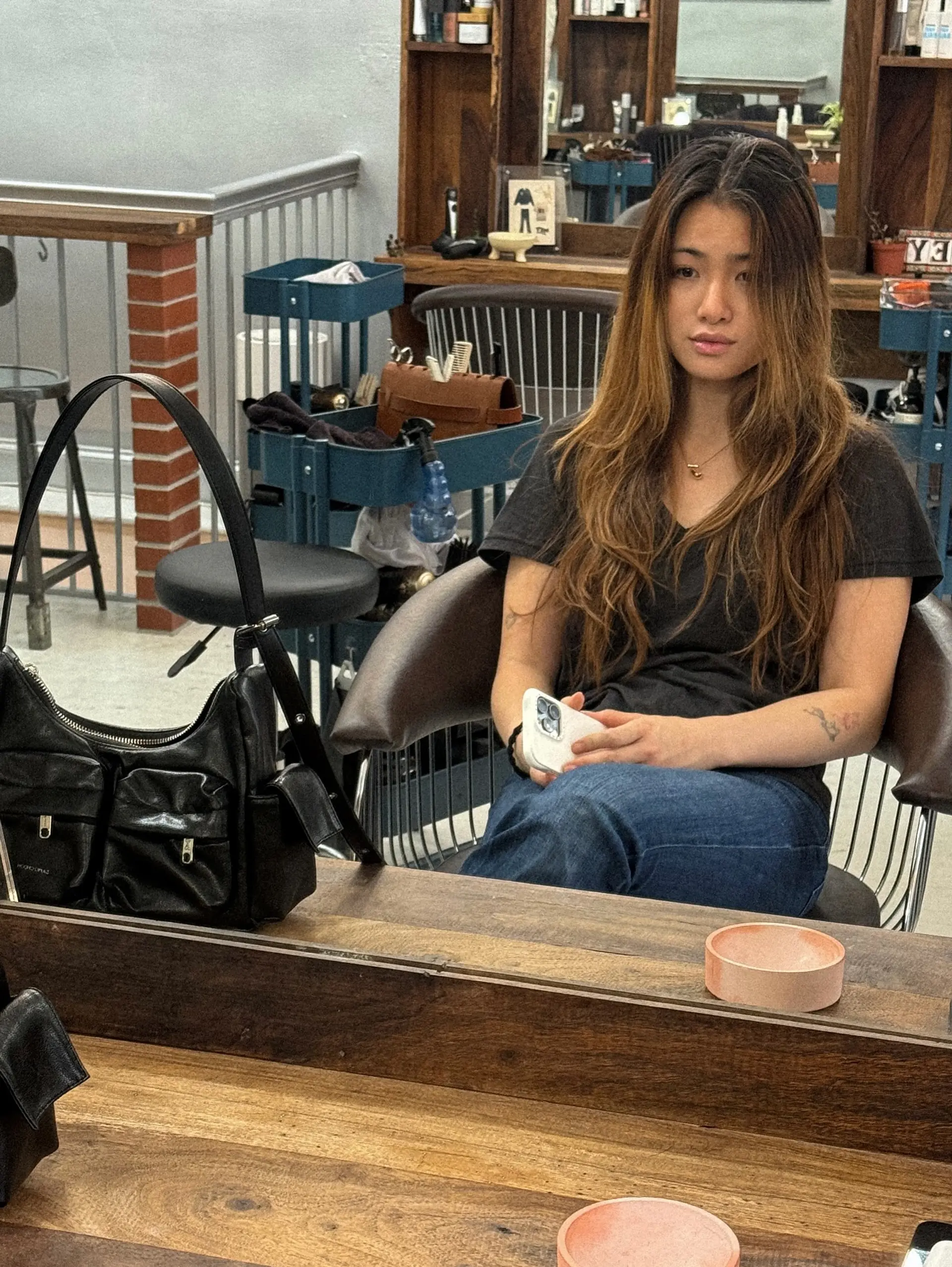 A medium-length shag with layers and balayage highlights. 5