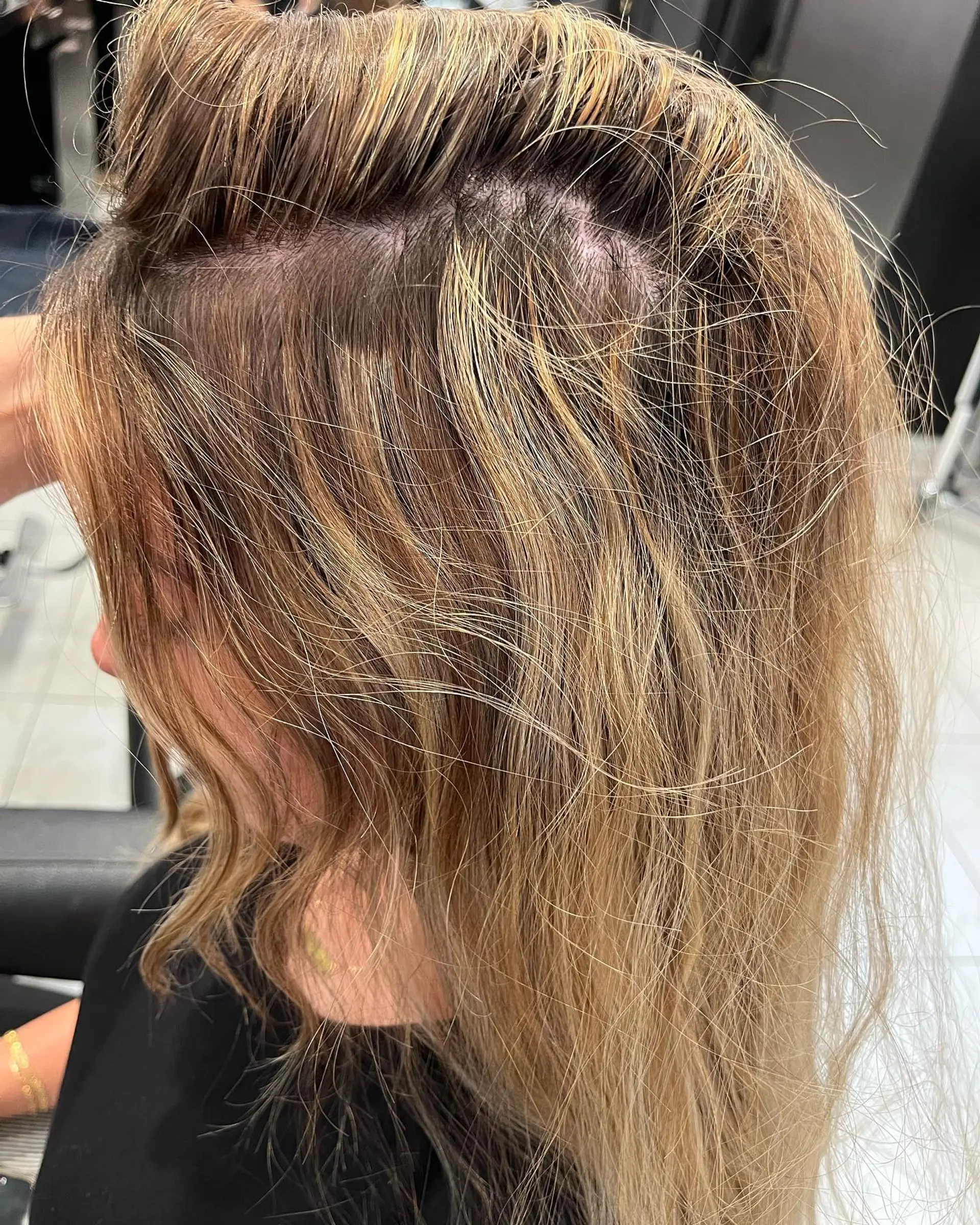 A breezy medium-length wavy hairstyle with relaxed beach waves. 2