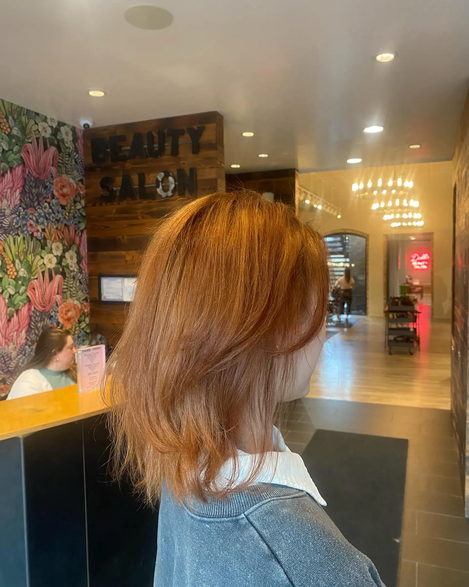 A layered bob with face-framing layers and trendy color. 1