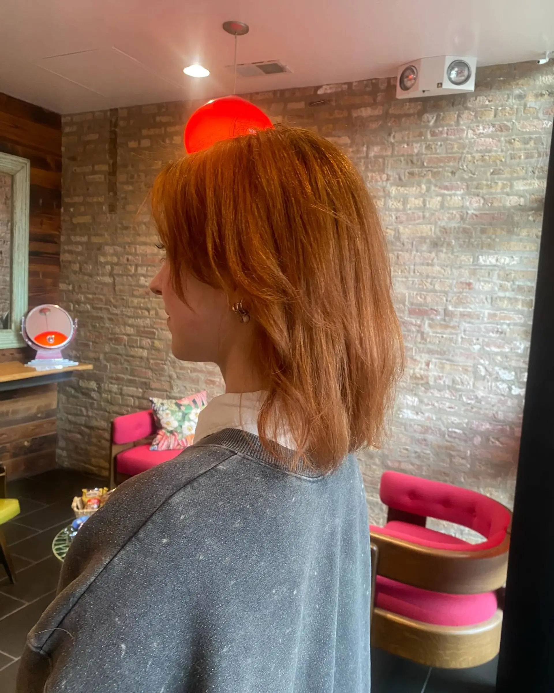 A layered bob with face-framing layers and trendy color. 2