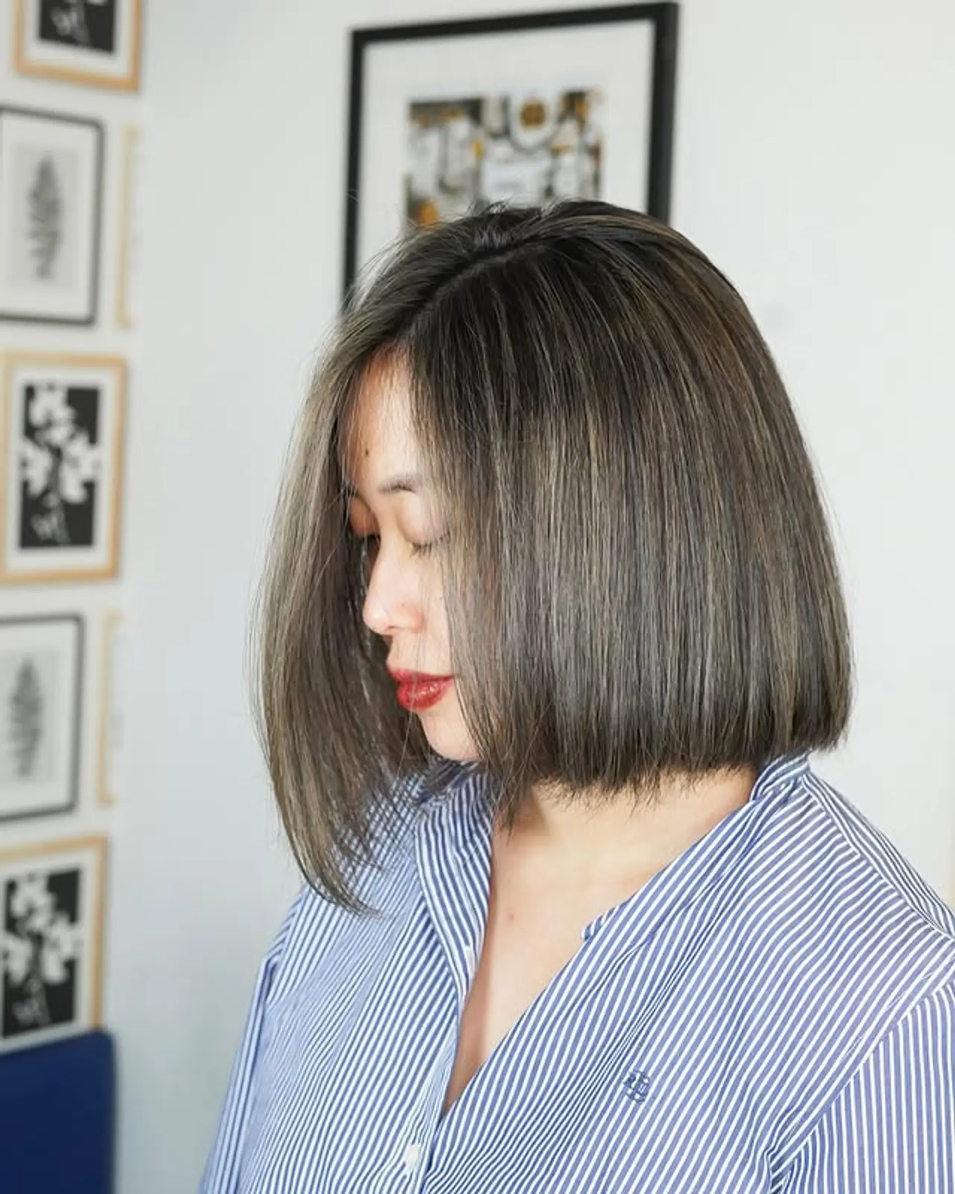 A blunt bob with ash blonde highlights. 1
