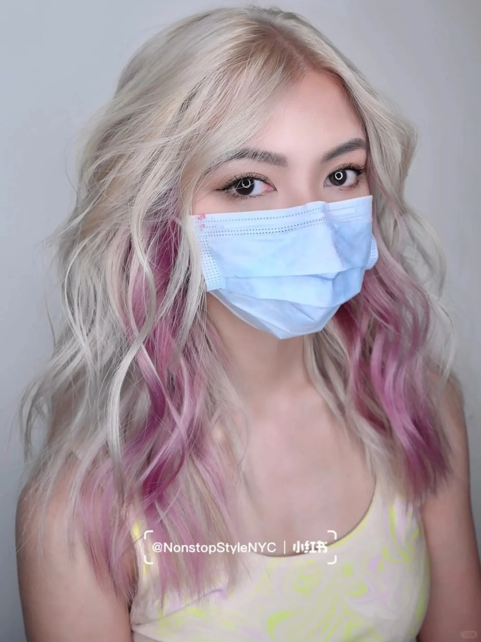 Platinum blonde wavy hair with lilac purple ombre tips, medium length, and layered for volume and bounce.

(NonstopStyle: by Kelvin) 1