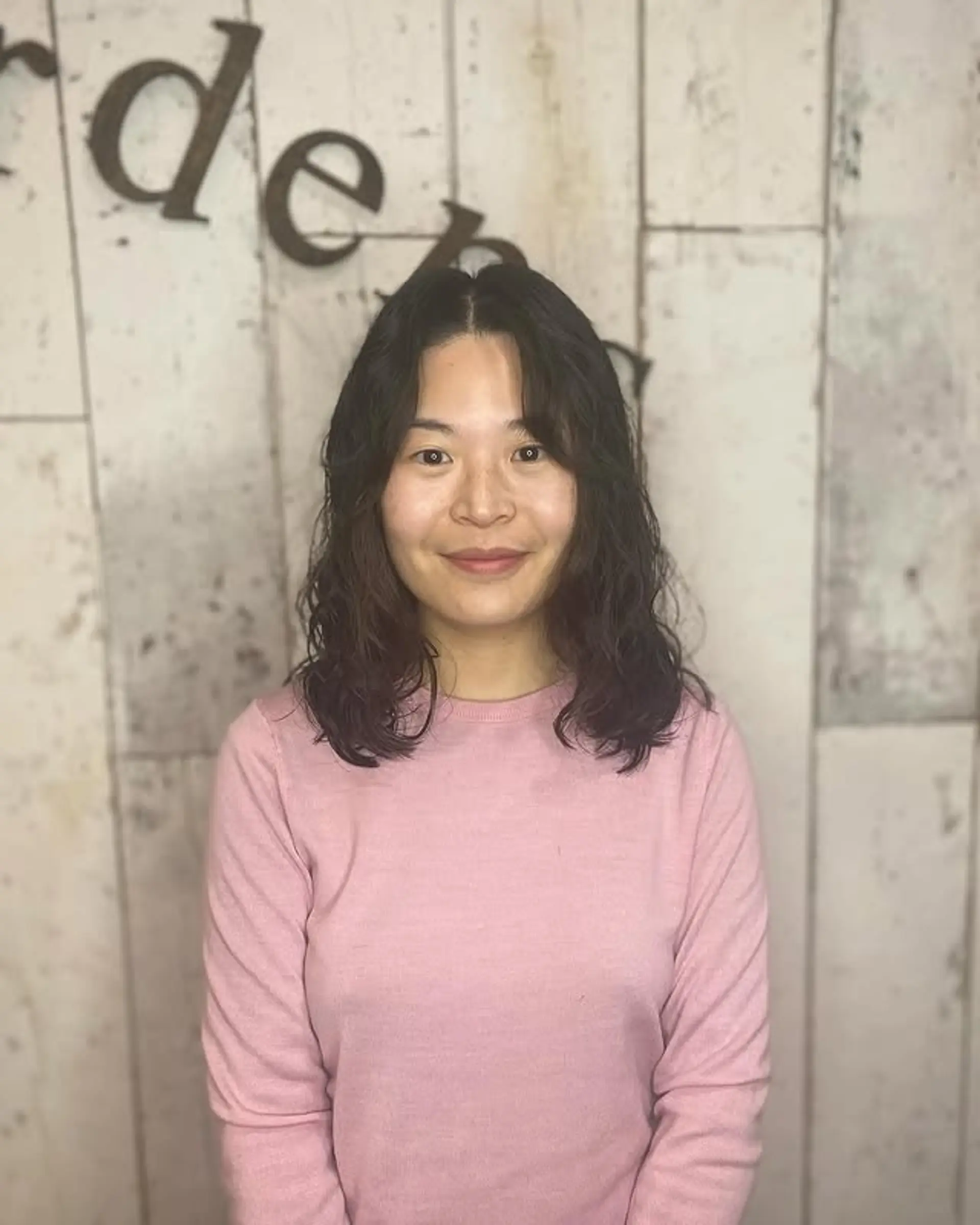 A modern wavy shag with face-framing layers and trendy bangs. 1