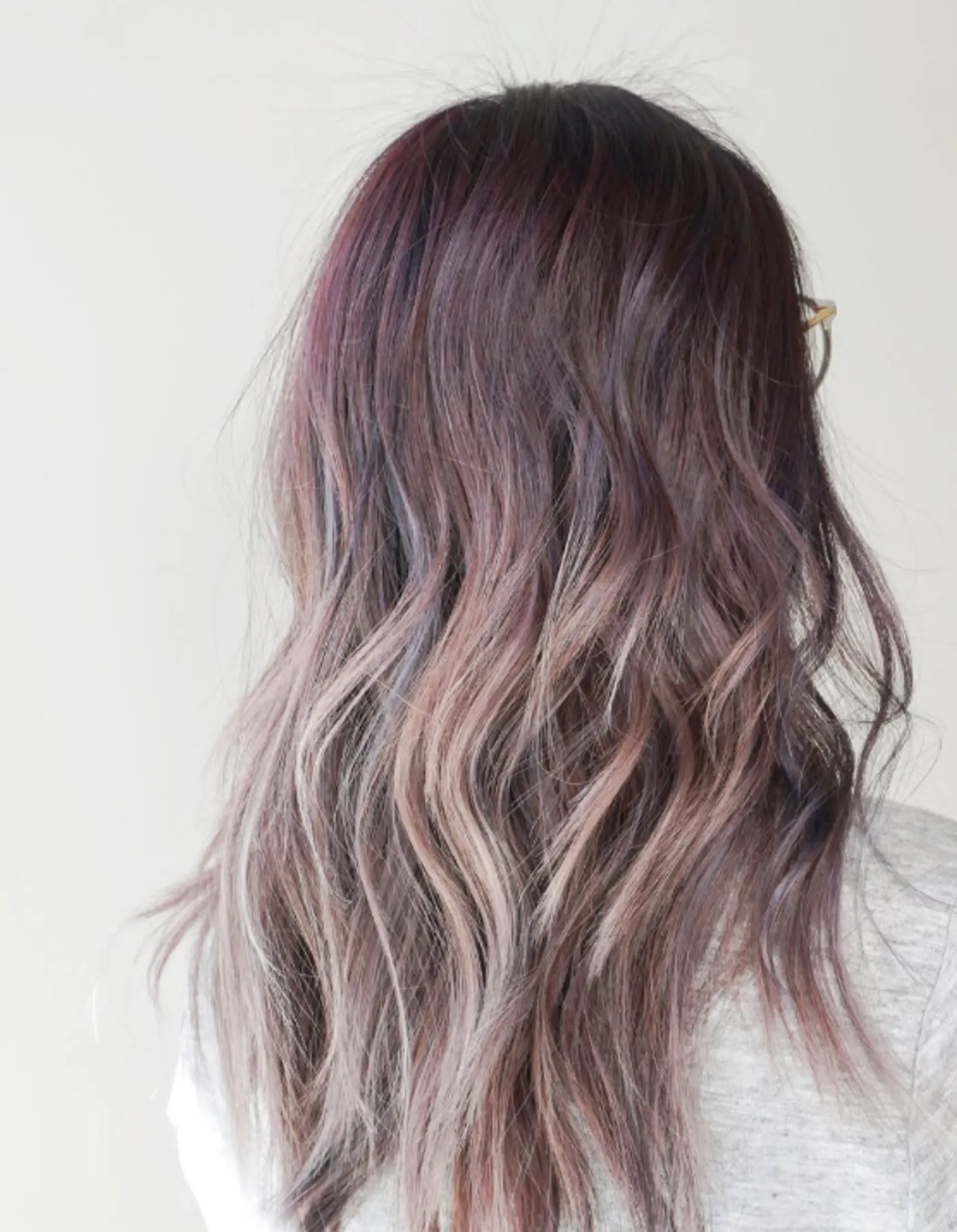 Long wavy hair with a smoky lavender ombre. 1
