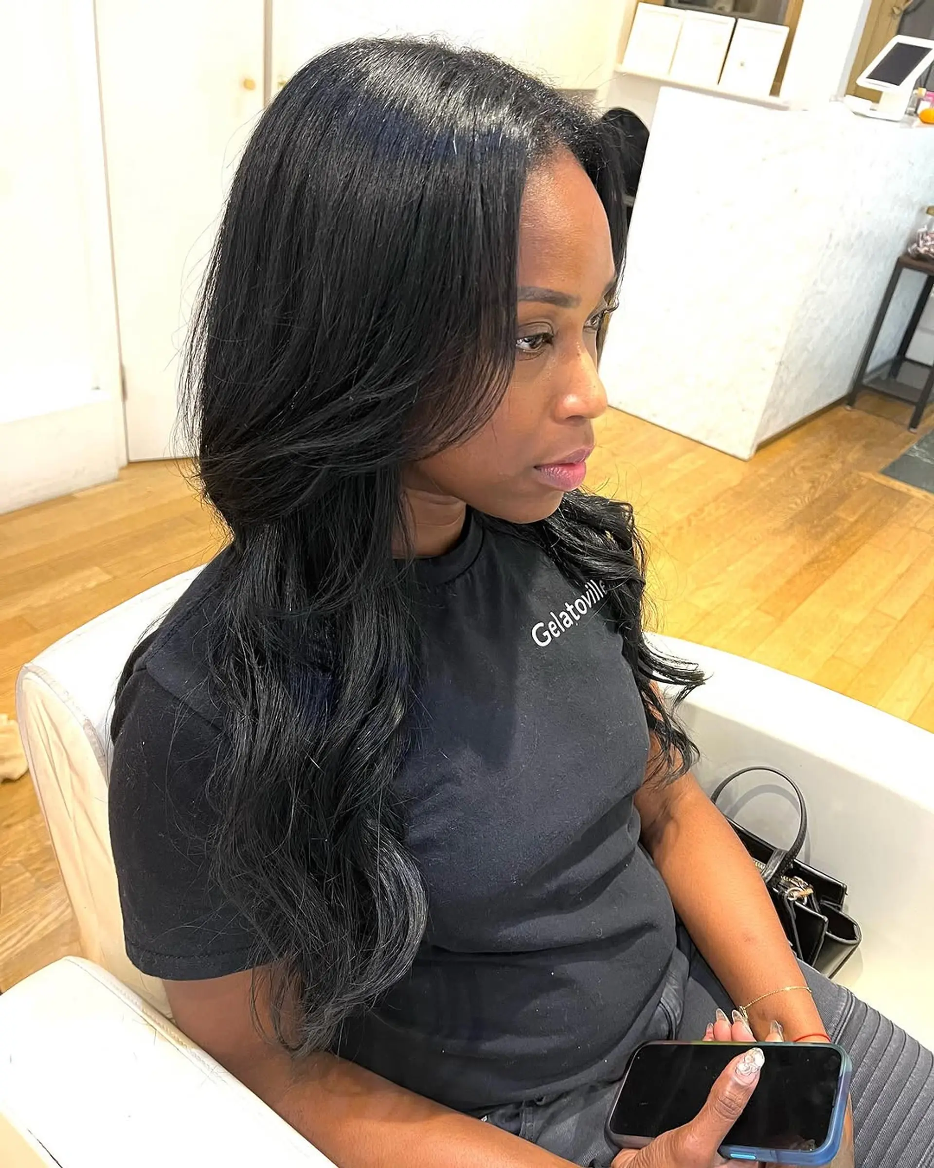 A long, layered blowout with face-framing layers. 1