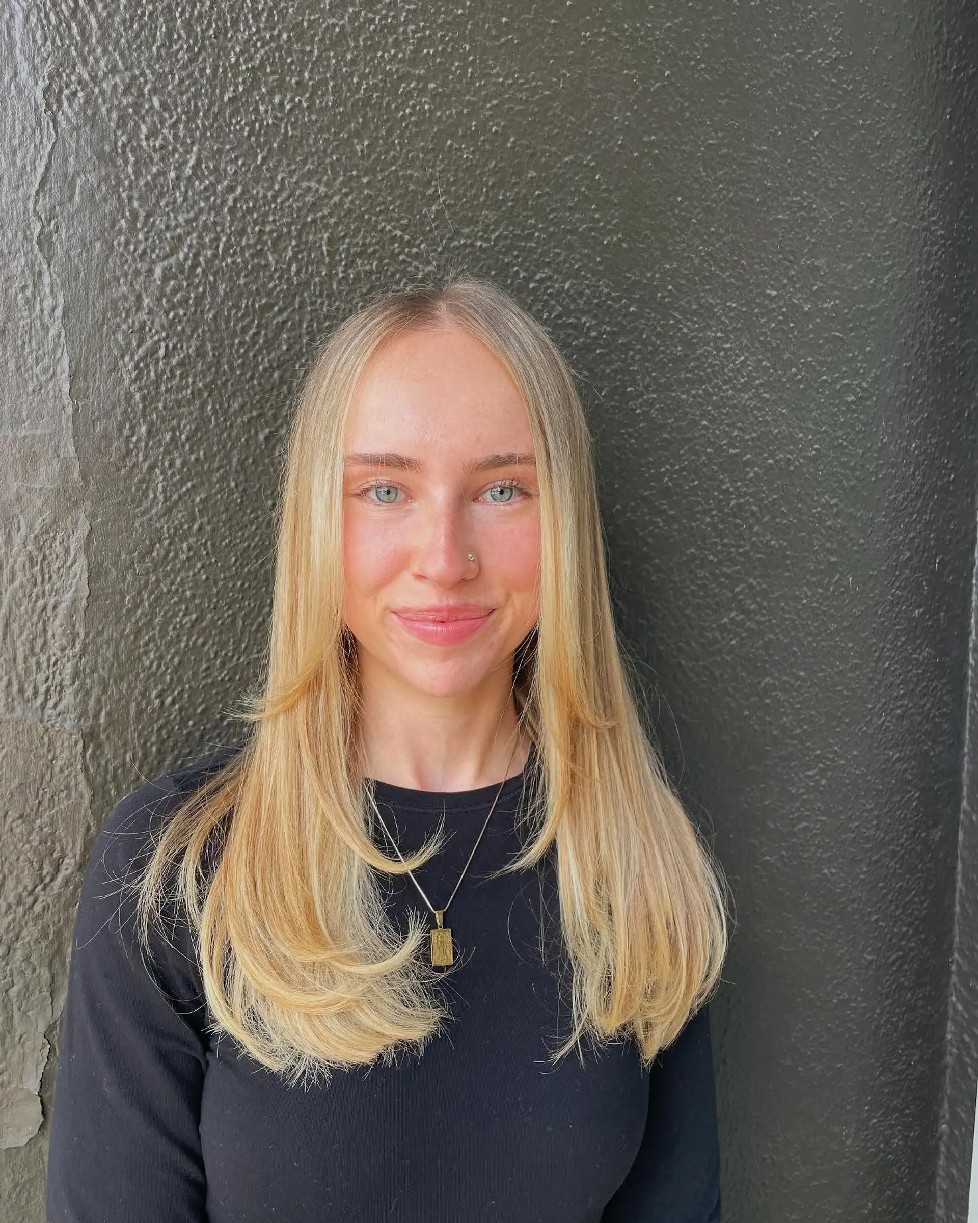 Long, straight cream blonde hair with layered face-framing. 1