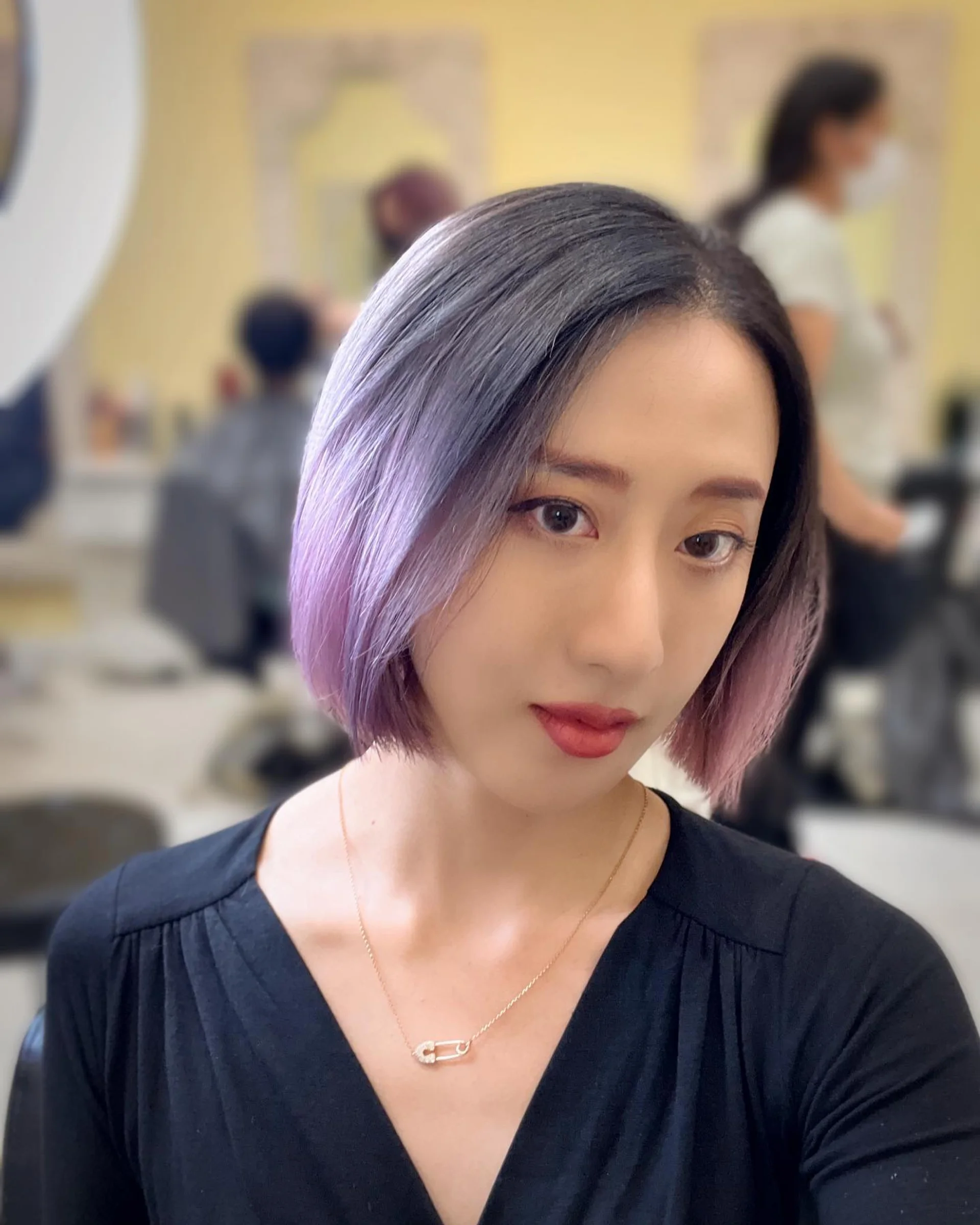 Sleek black bob with subtle peekaboo silver highlights, perfect for a professional tech environment. - Preview 1