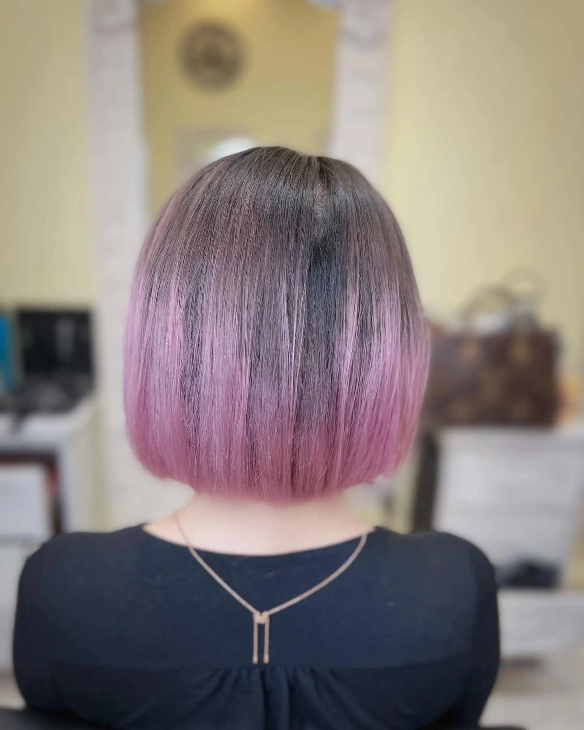 A chic, short inverted bob with a stunning lilac ombre. 2