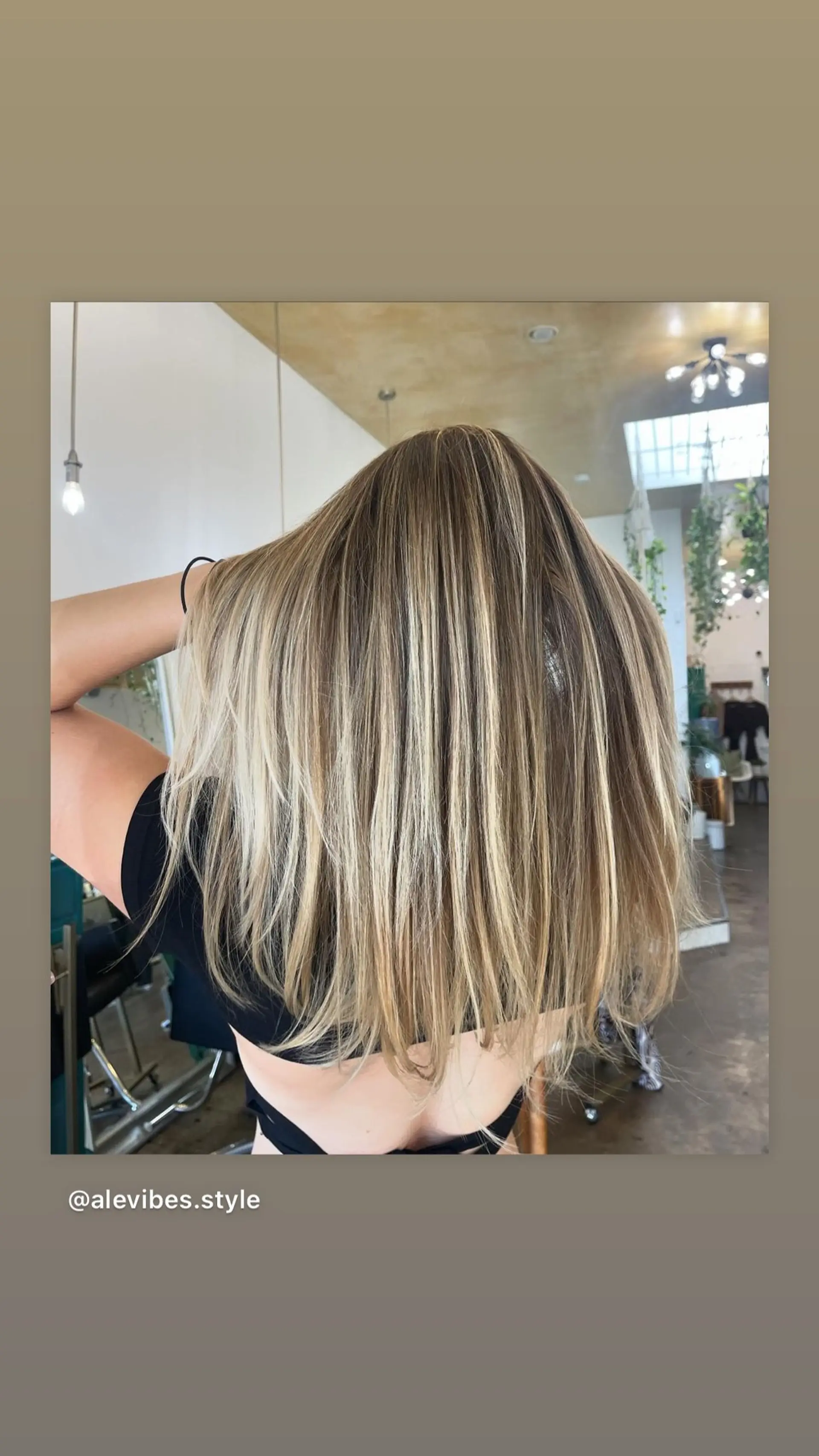 A stunning medium-length lob with a seamless balayage, blending light brown roots into bright blonde ends. 1