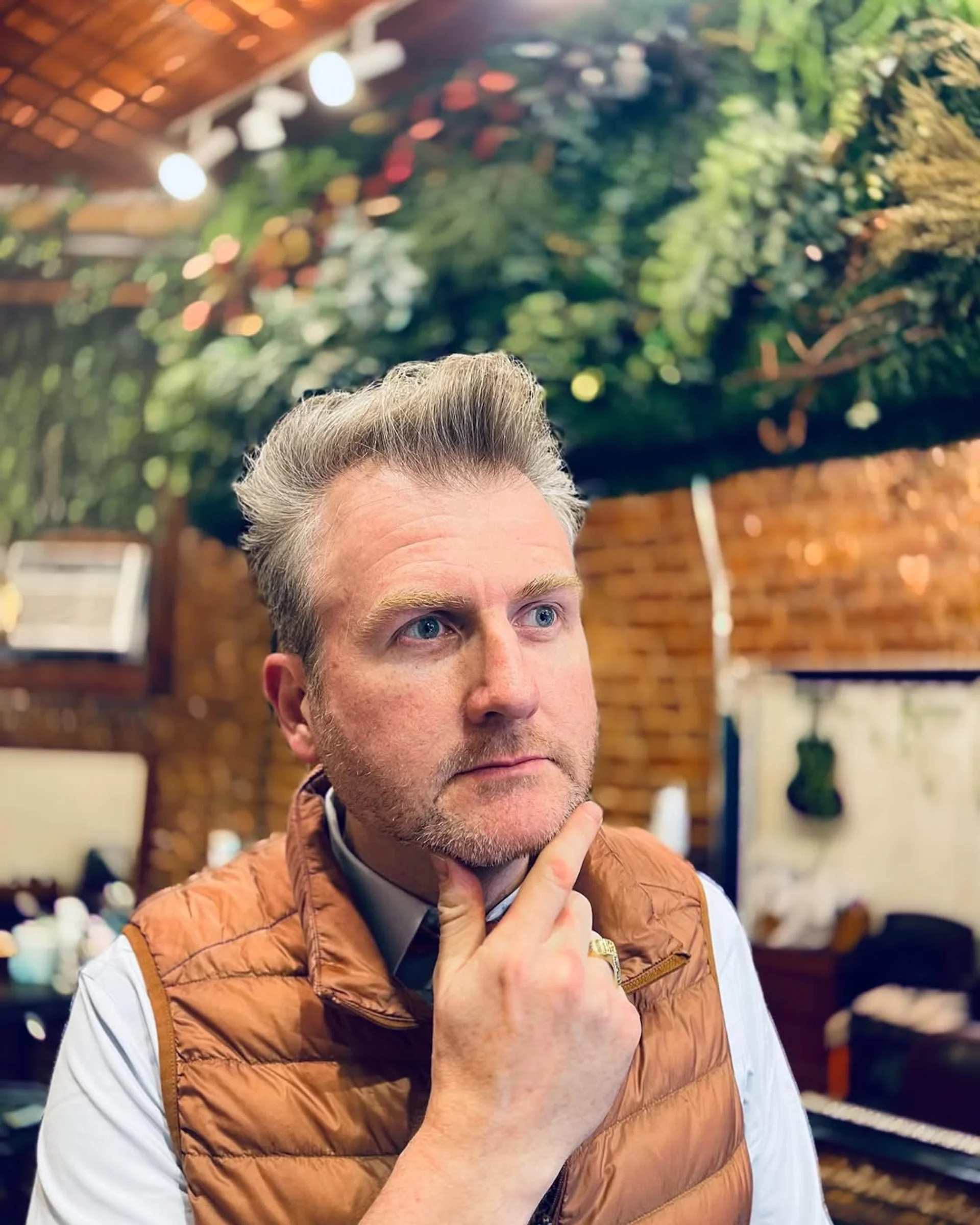 A stylish man sporting a textured pompadour, emphasizing volume and natural hold. - Preview 1