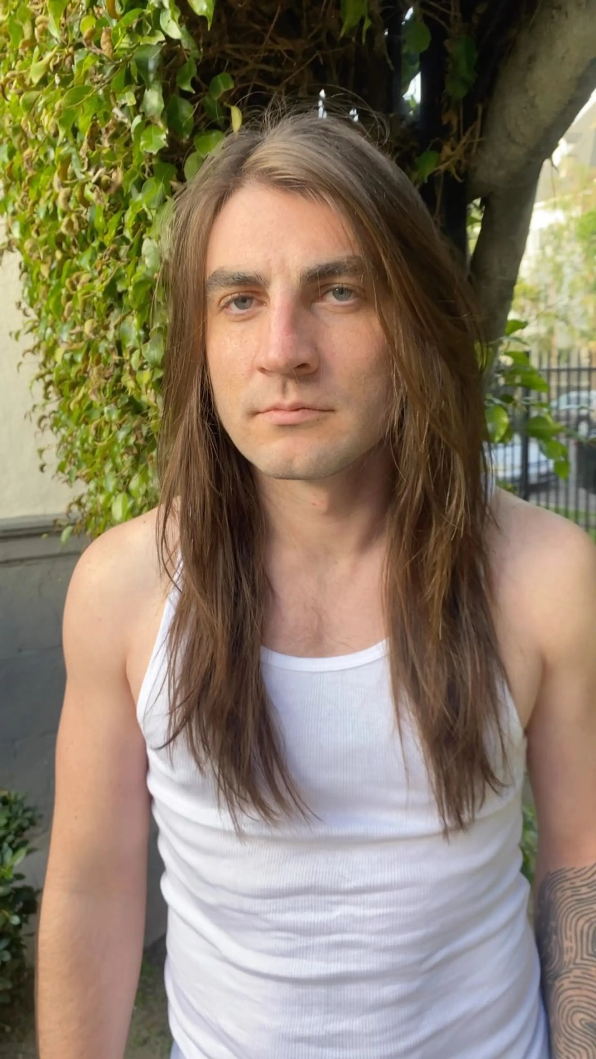 Long straight light brown hair with shattered, texturized layers throughout and face-framing pieces. 1