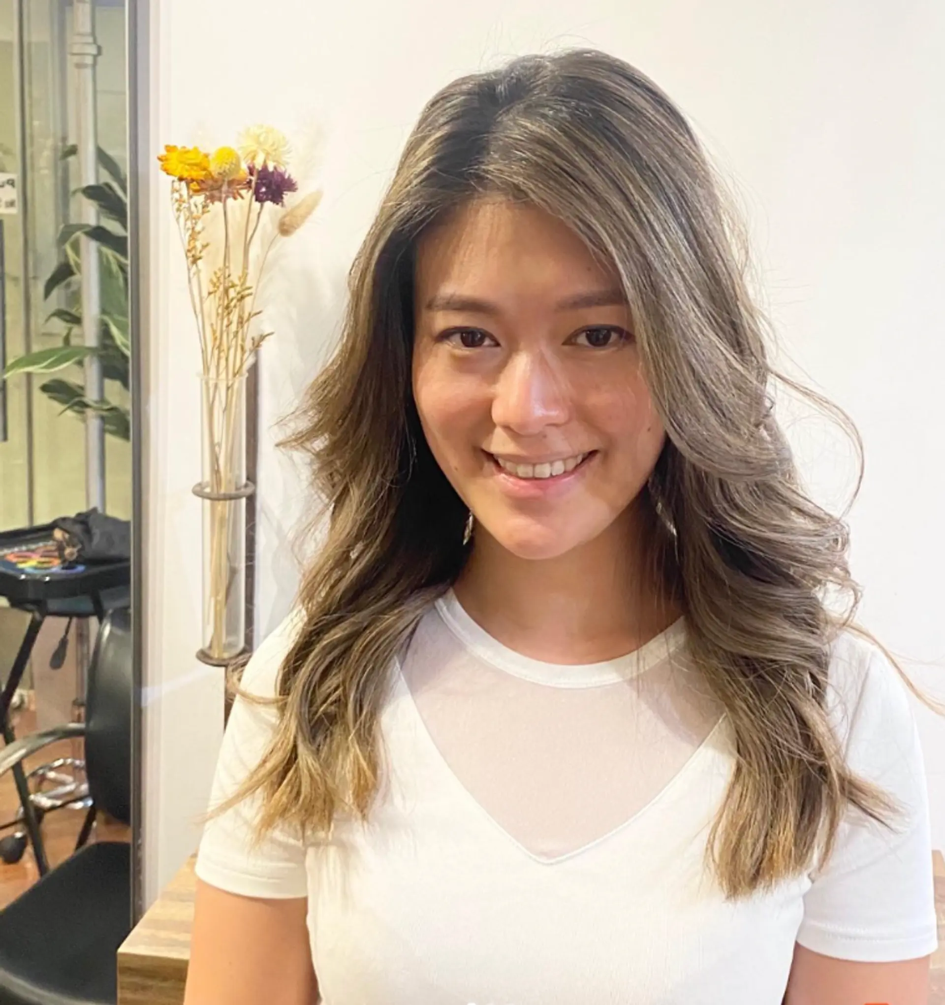 Long, wavy hairstyle with a balayage for a dimensional look. 1