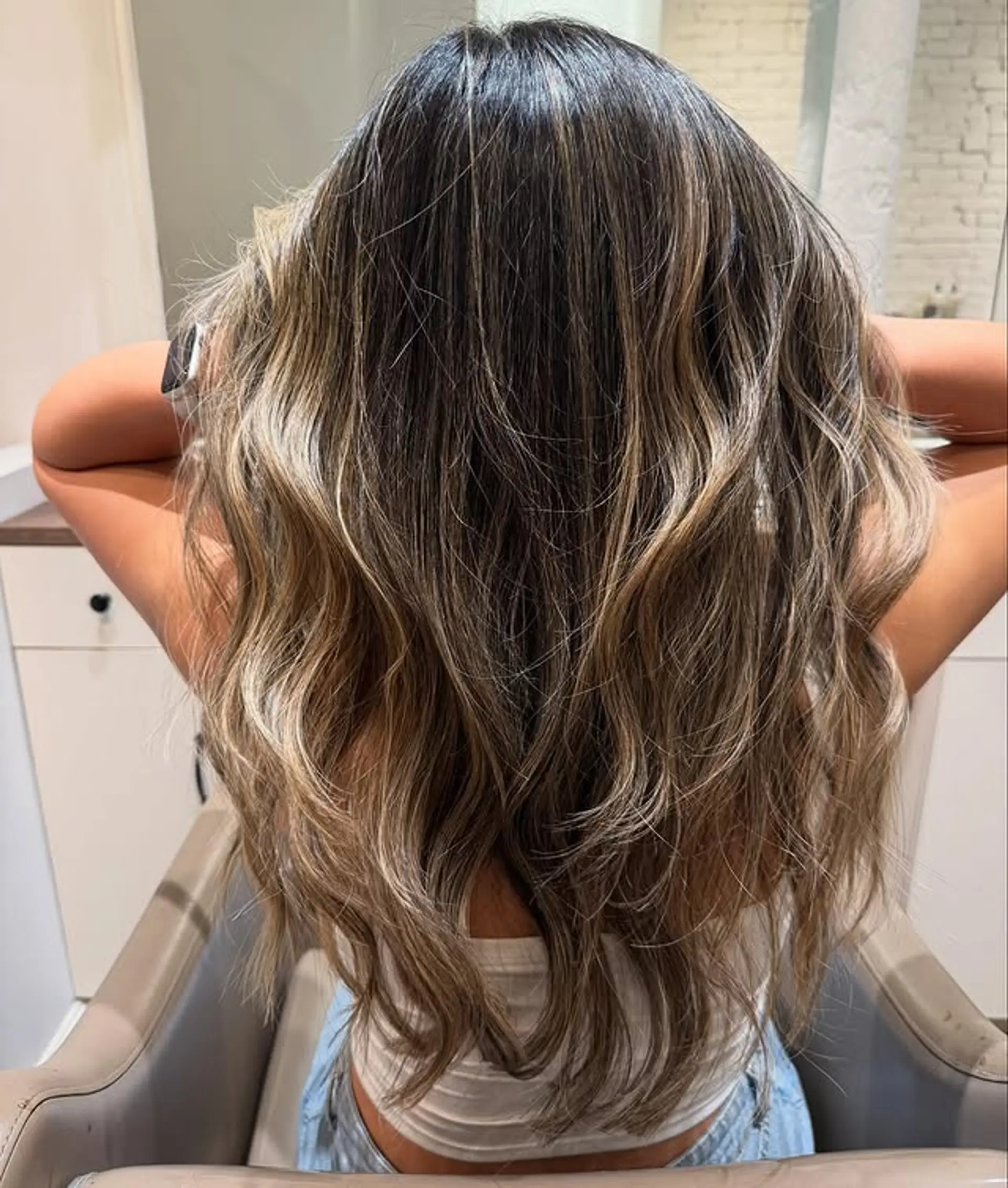 Long, wavy bronde balayage with rooted blonde highlights. 1