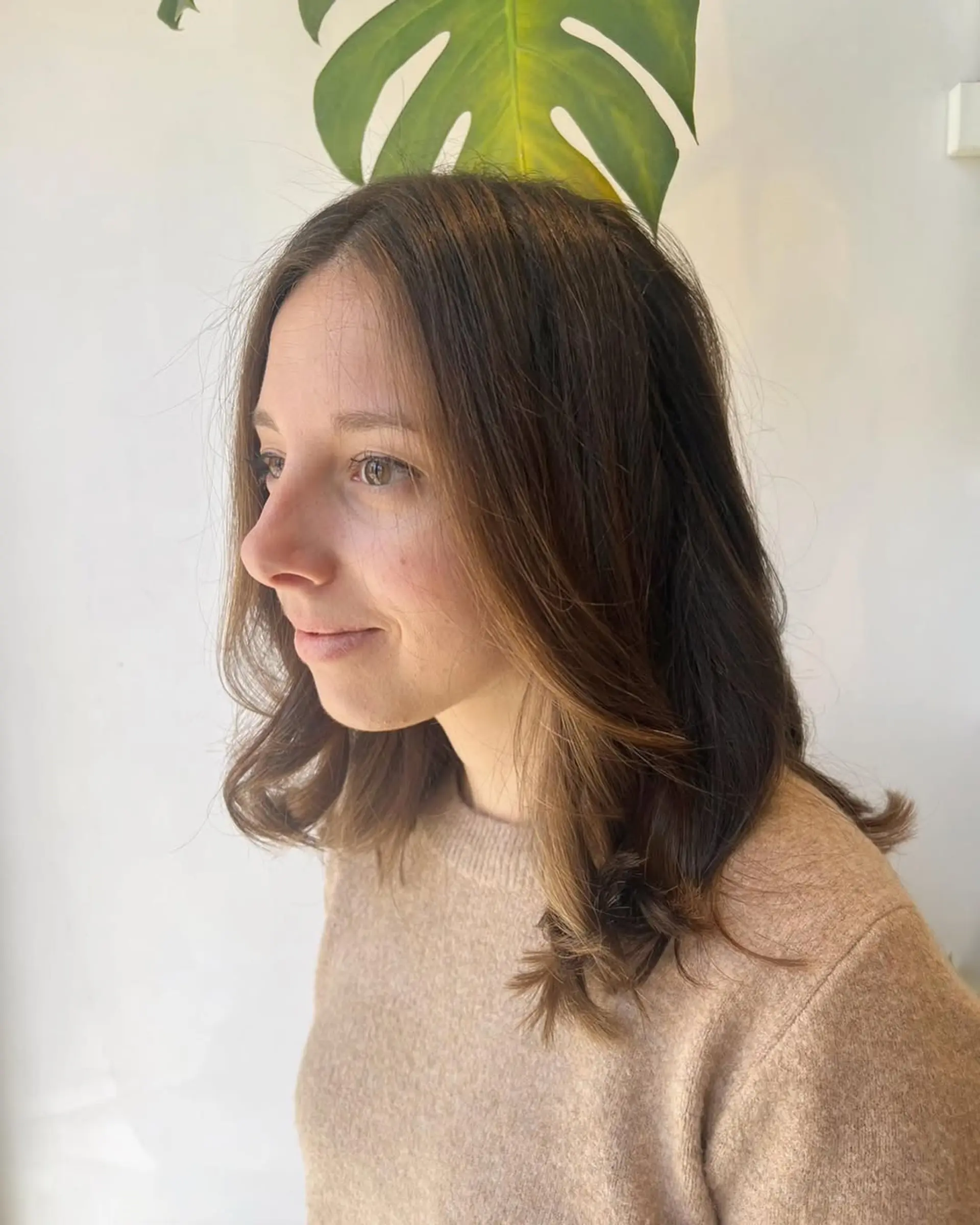 A trendy lob with subtle layers and soft waves. 1