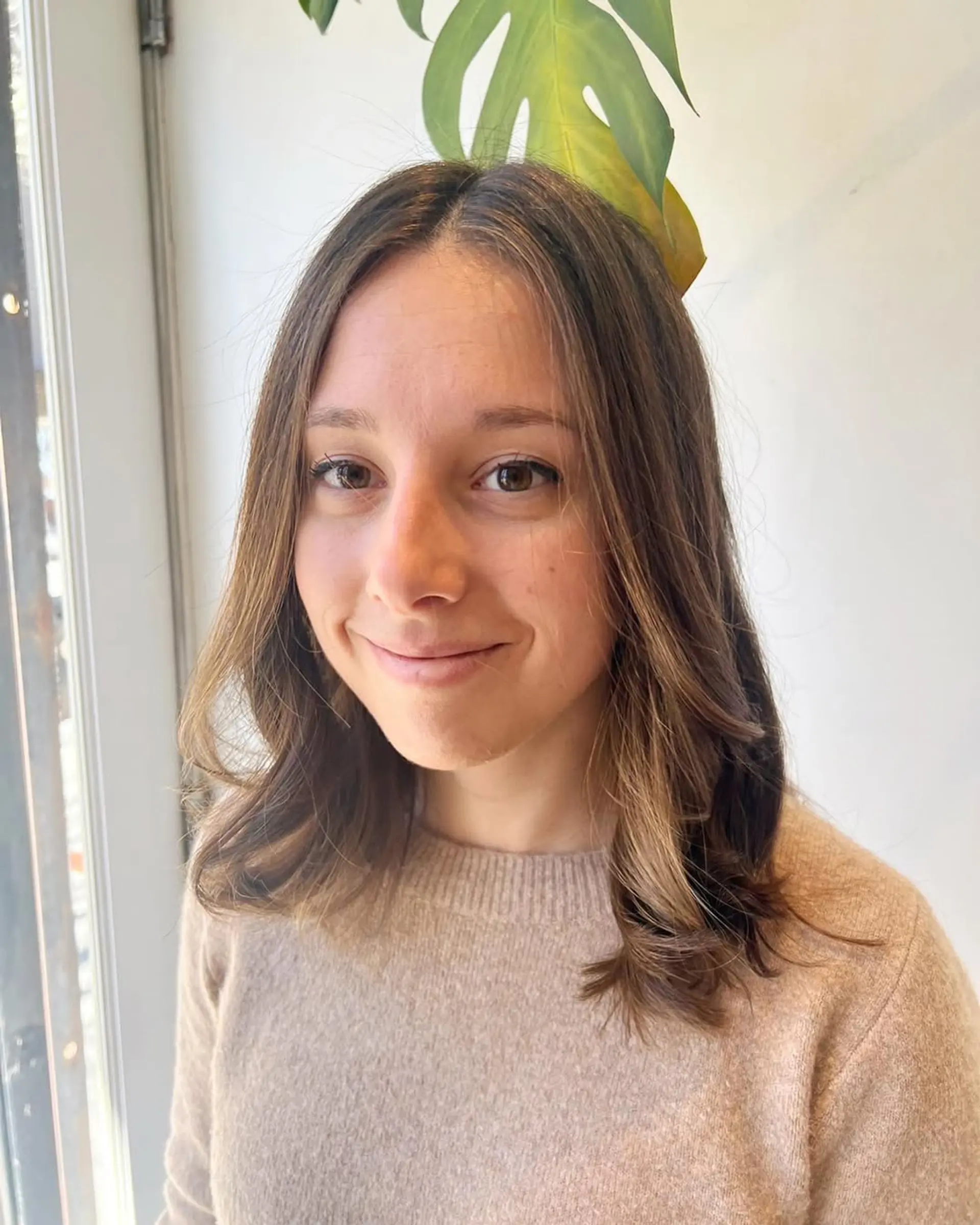 A trendy lob with subtle layers and soft waves. 2