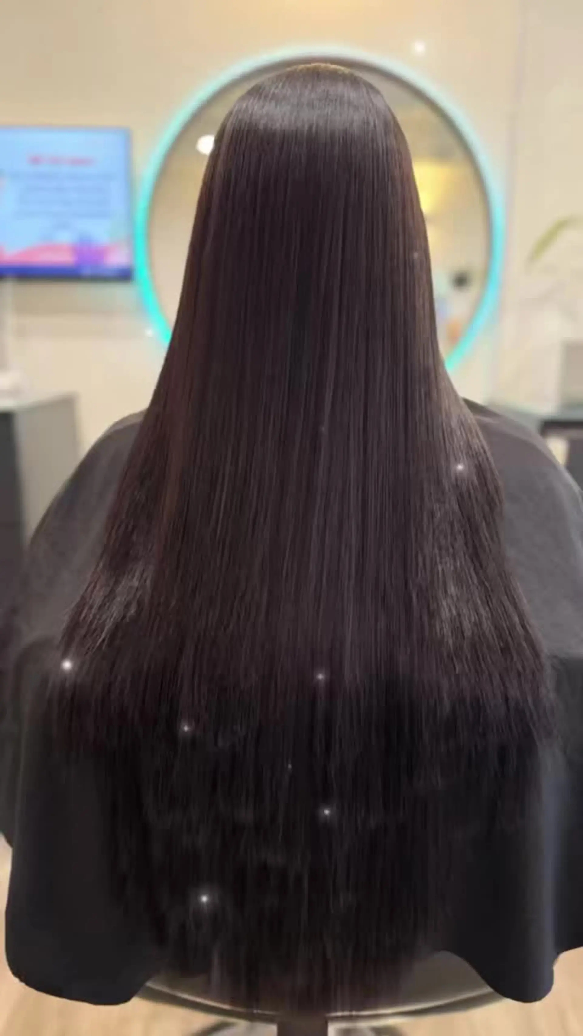 Ultra-sleek, pin-straight long hair with a high-shine, glossy finish. 1