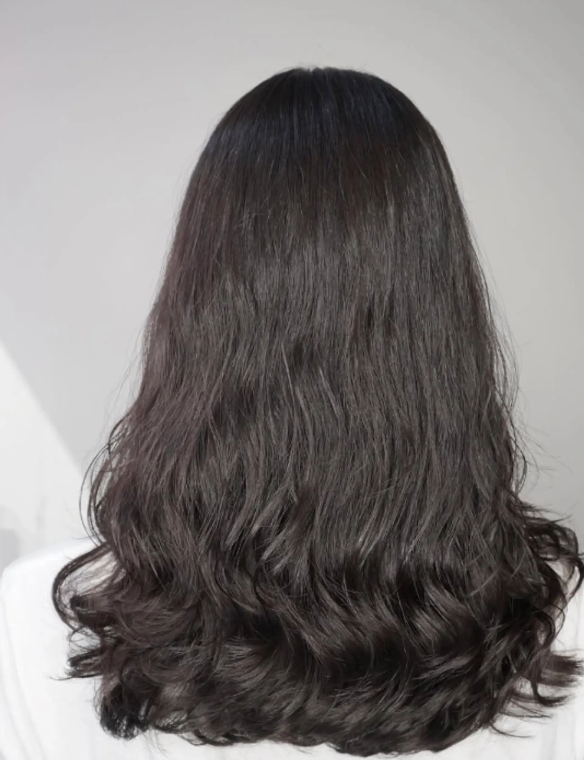 Long, flowy waves with layered ends for a soft and elegant look. 1