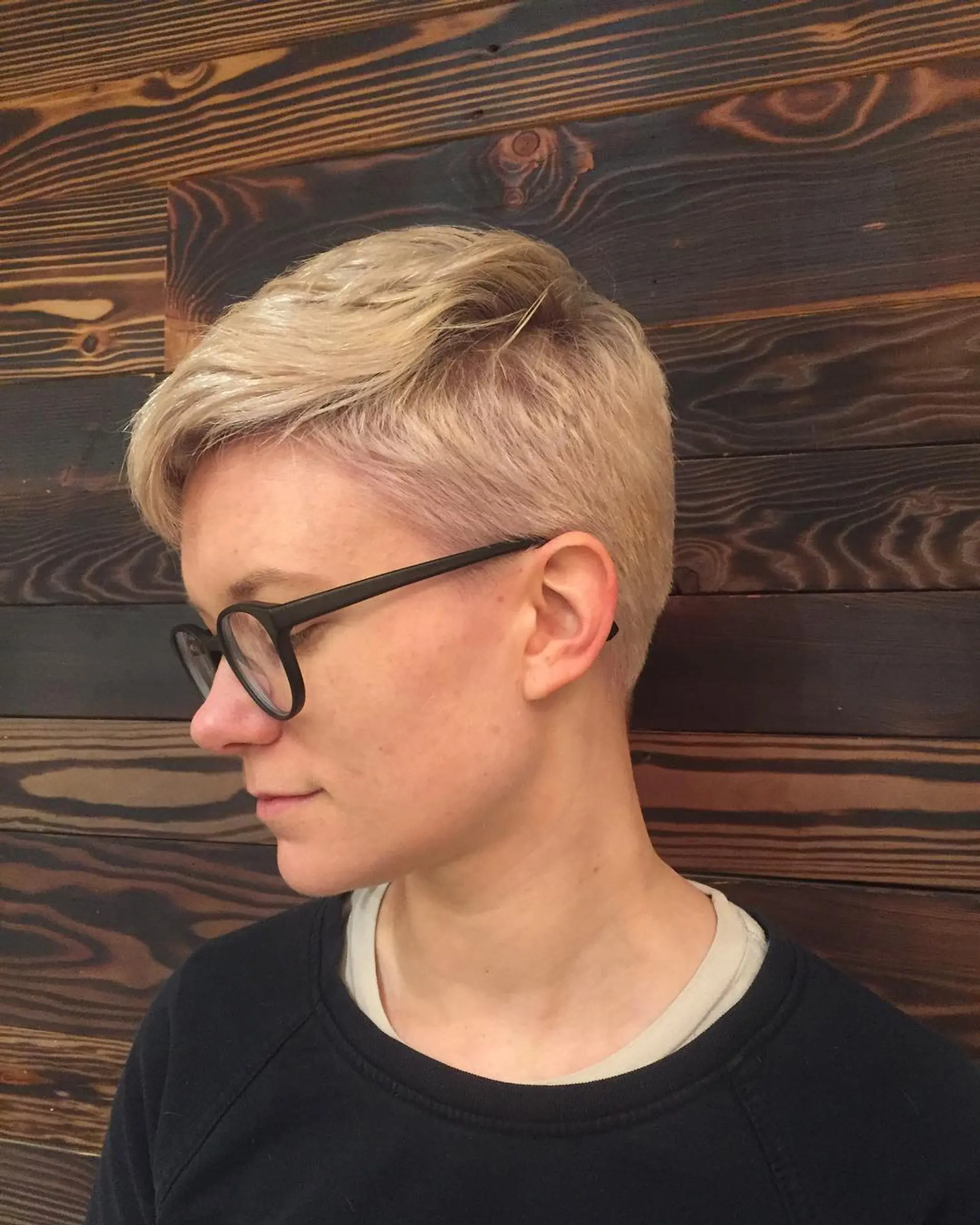 A textured pixie cut with slightly longer layers on top for added volume and style. 1
