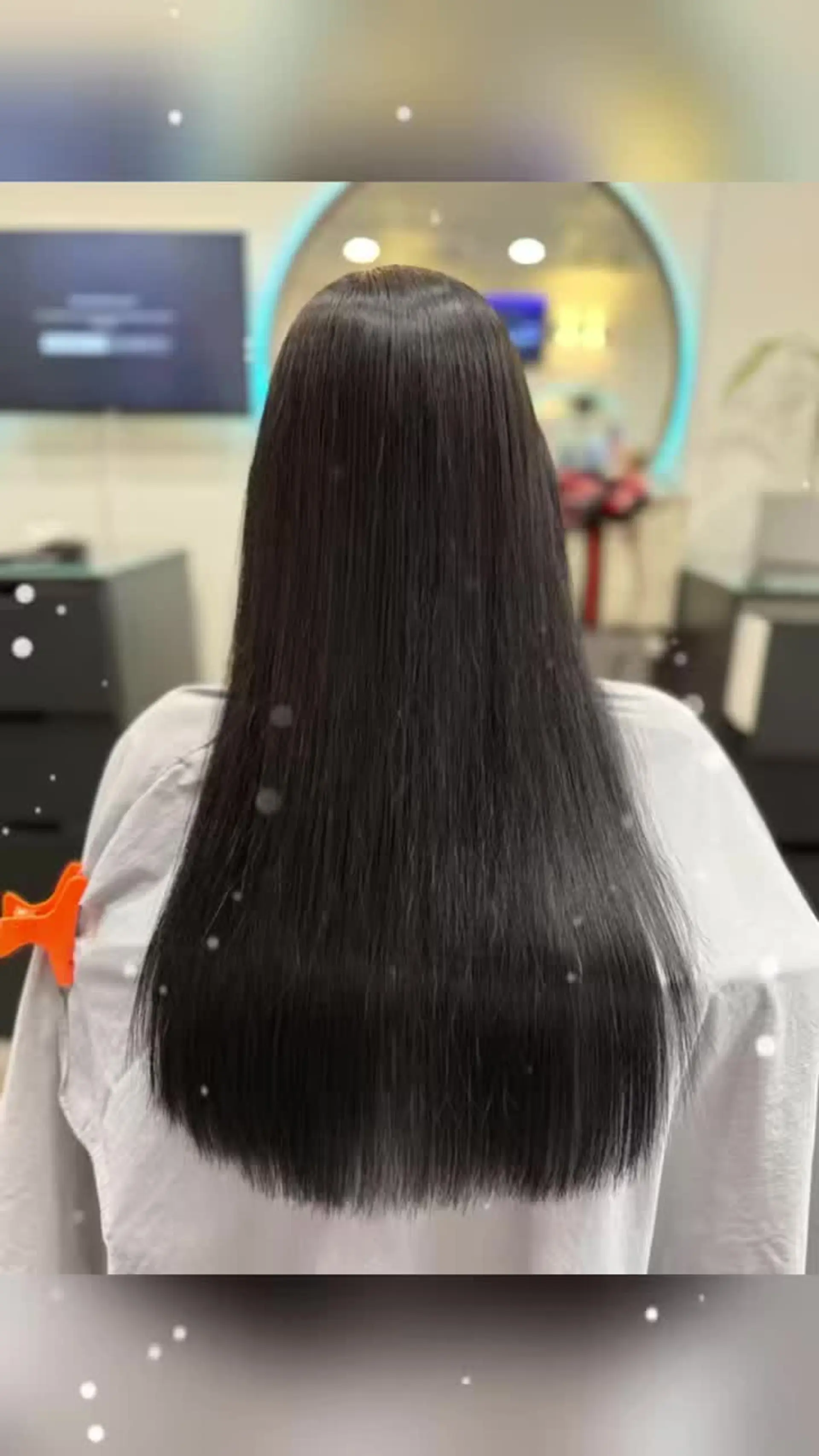 Long, ultra-sleek pin-straight dark hair with a smooth finish and clean ends. 1