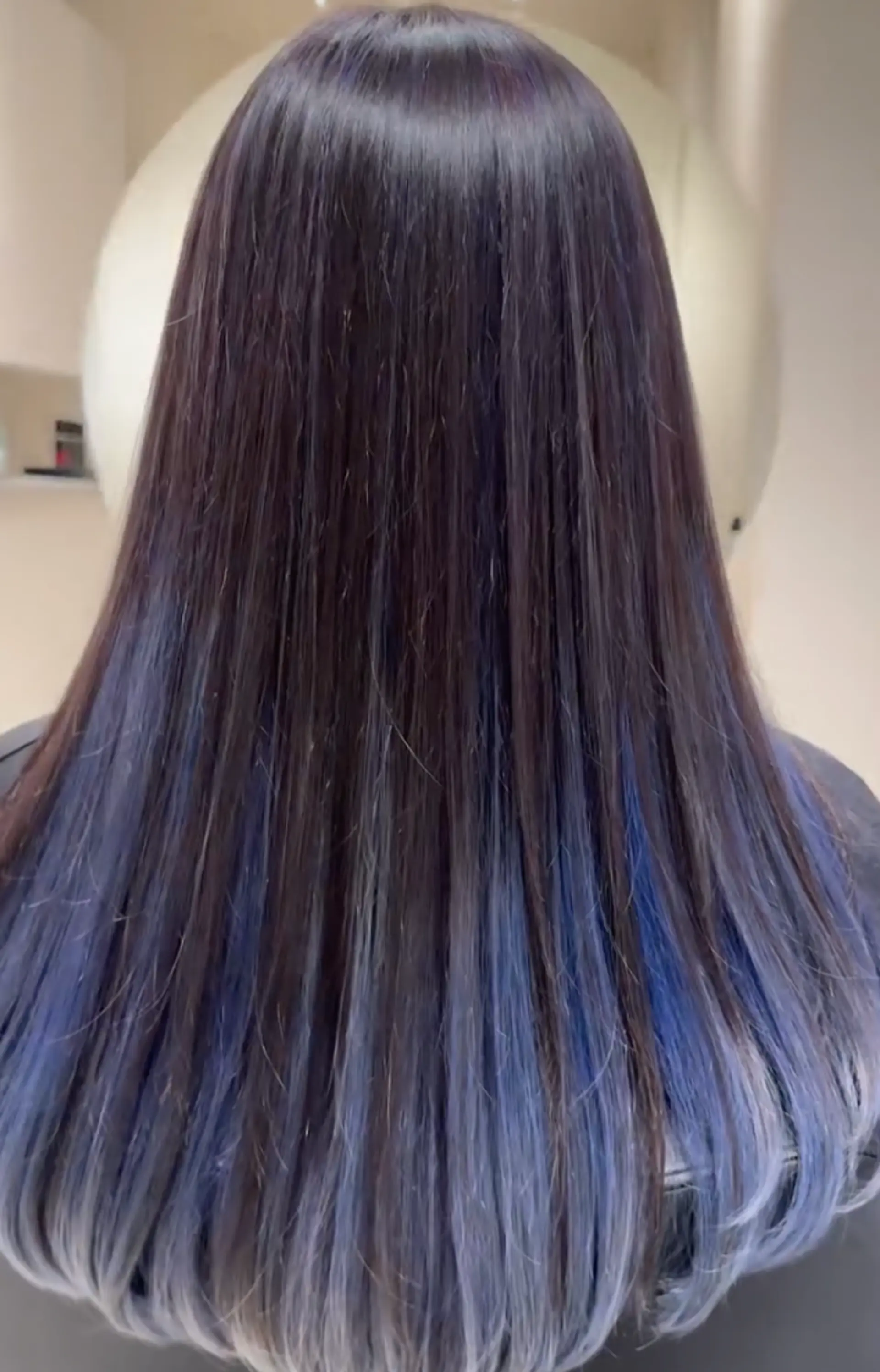 Long, straight hairstyle with an ombre transition from black to blue, featuring sleek and shiny layers. 1