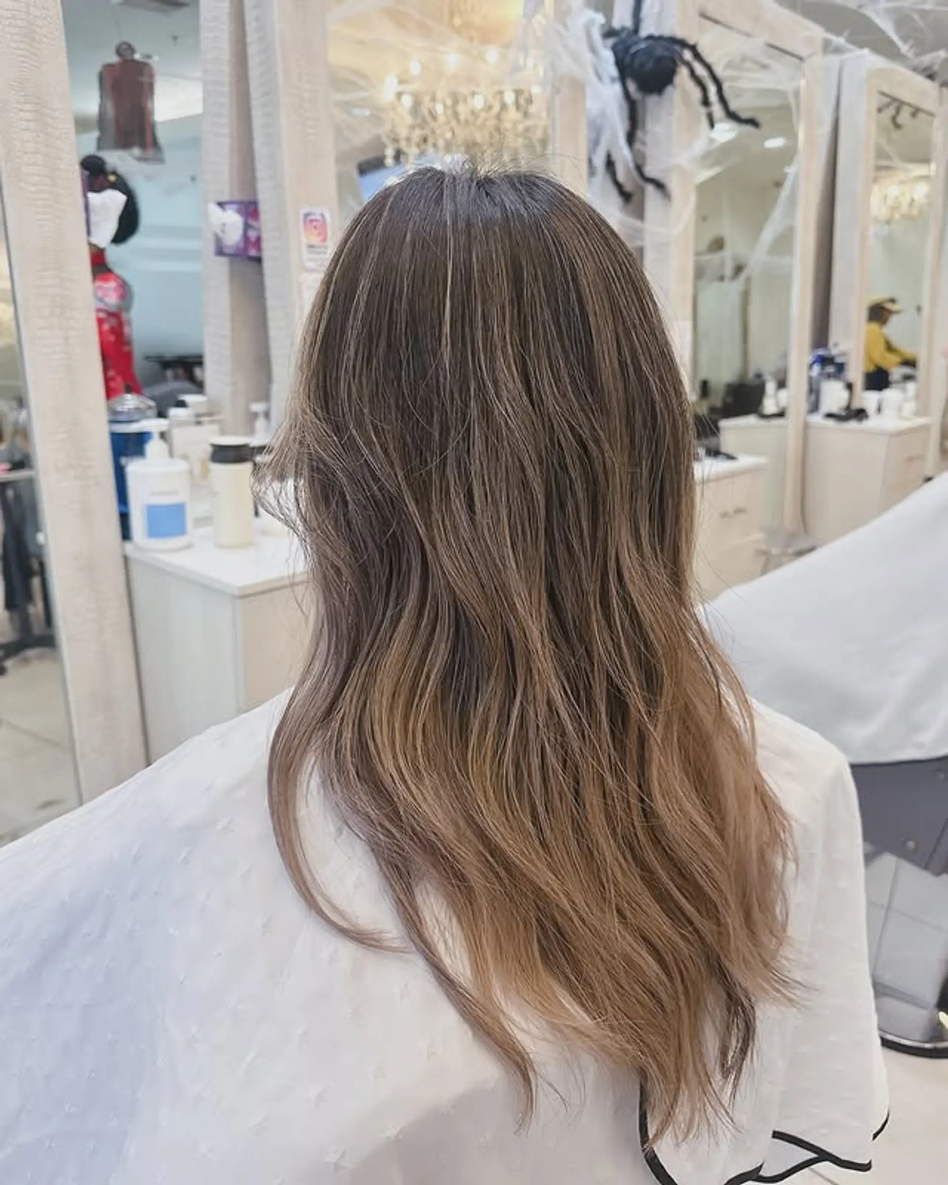 A bronde ombre with soft waves and subtle layers. 1