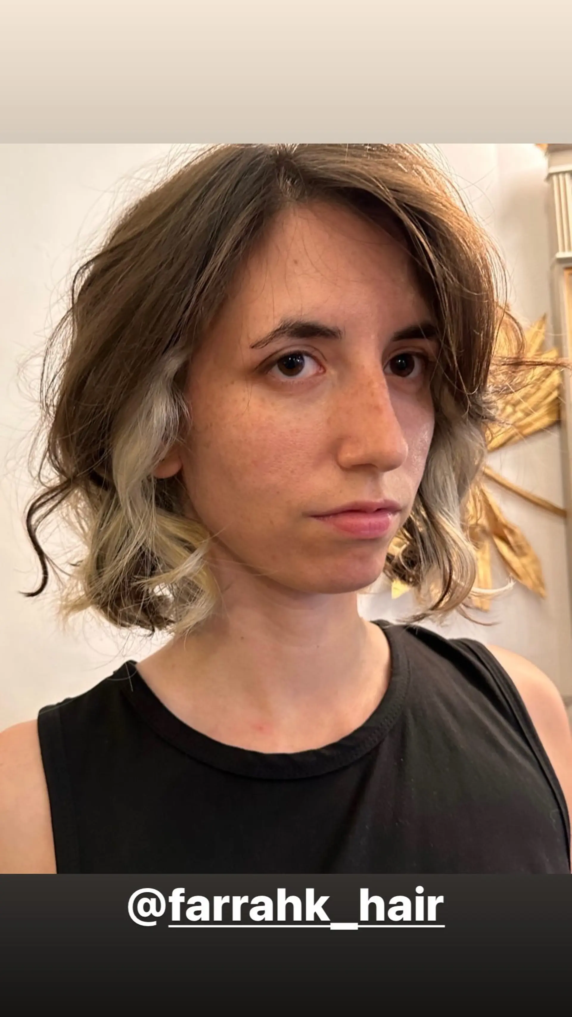 A wavy, medium-length bob with face-framing highlights. 1