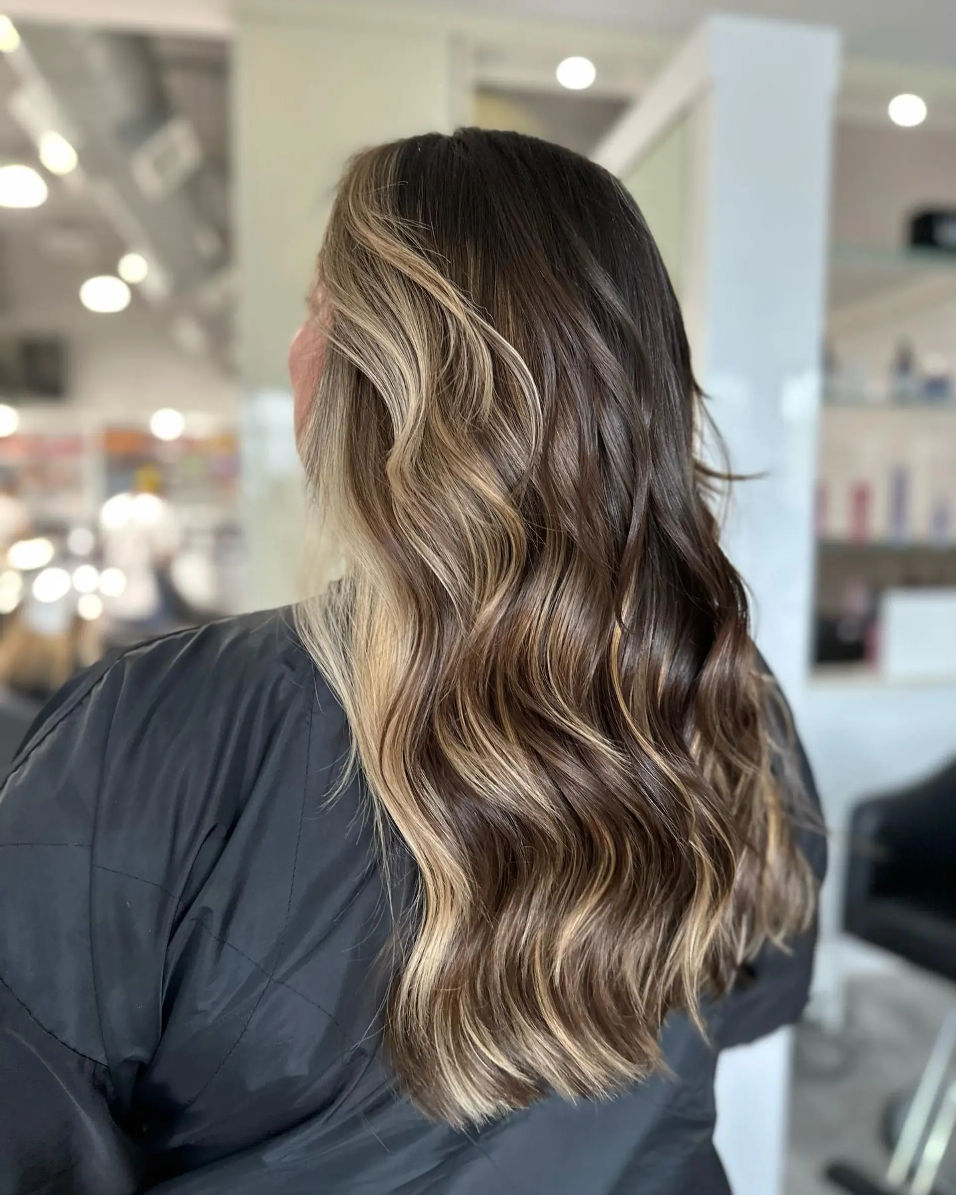 Long wavy hair with a caramel balayage. 1