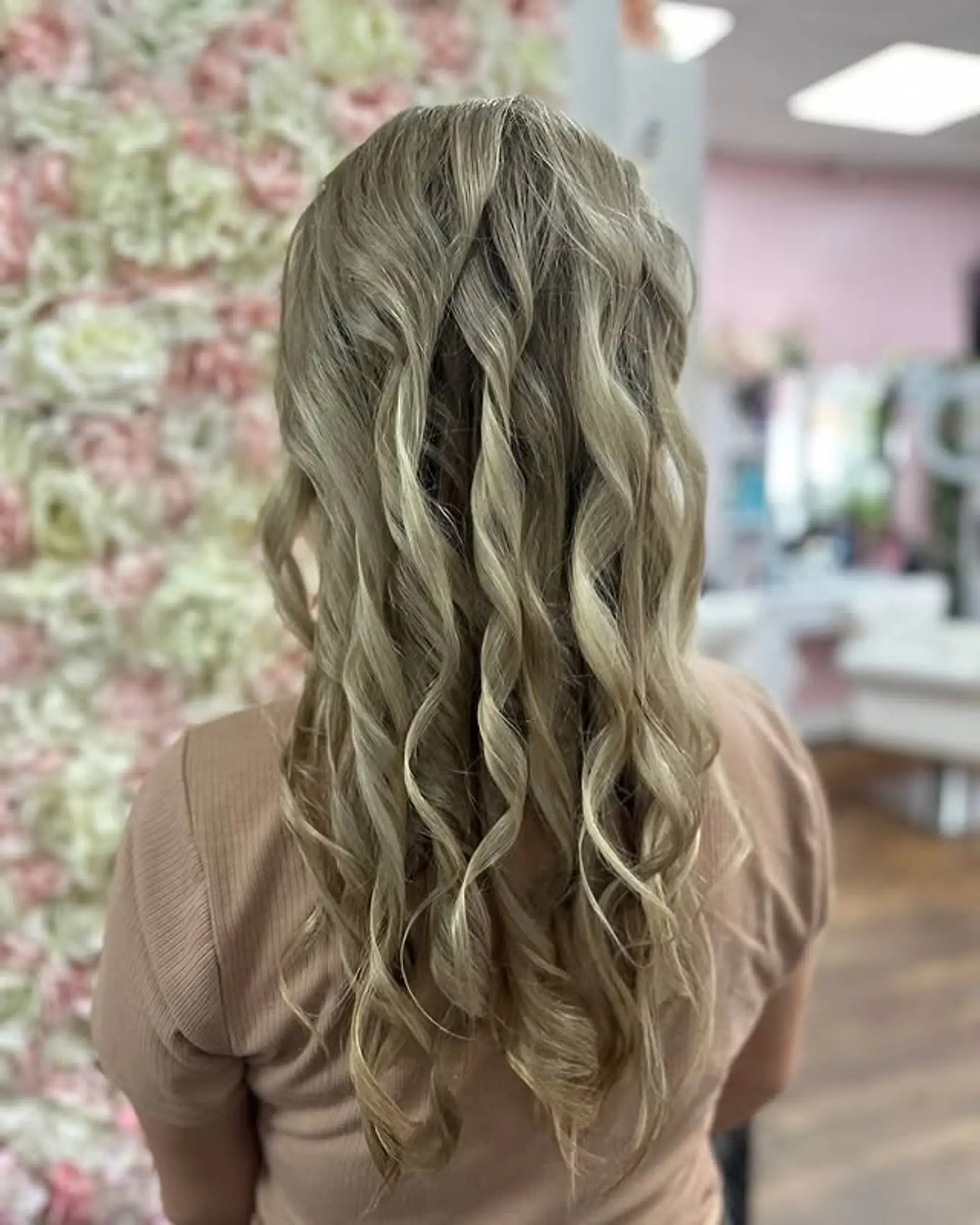 Long hair styled into romantic curls. 1
