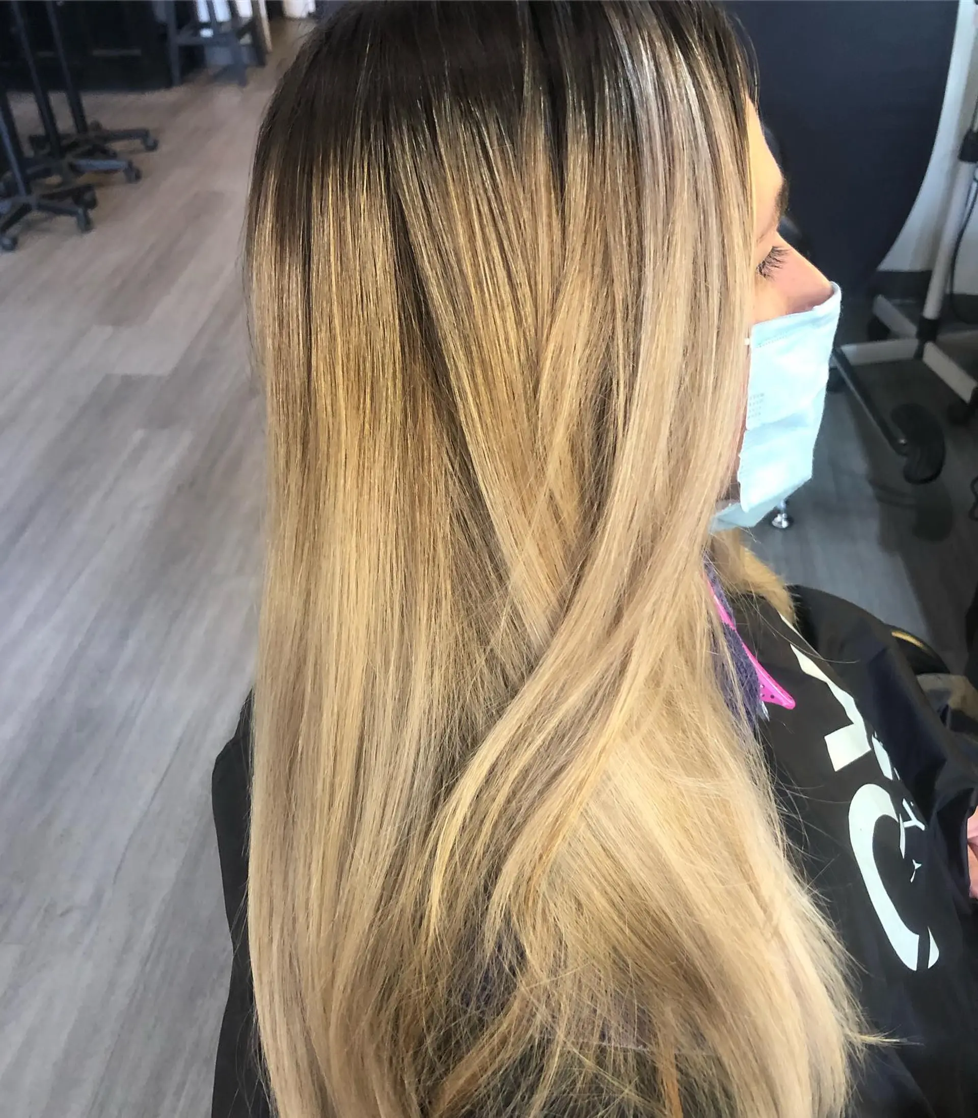 Straight, long warm-blonde hair featuring blended highlights and a soft natural root shadow. 1