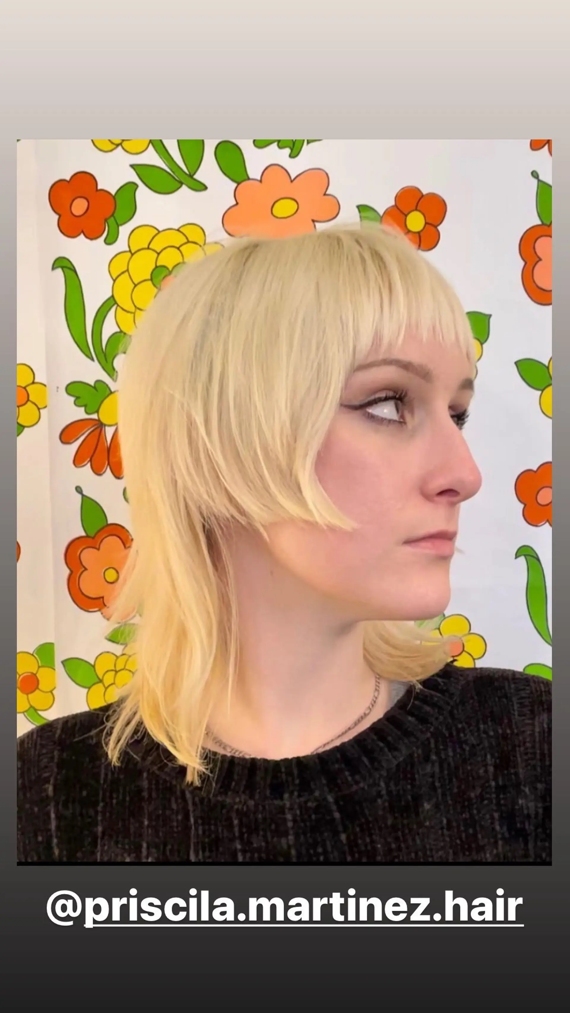 A modern take on the classic mullet with a shaggy, layered texture and blunt bangs. 1